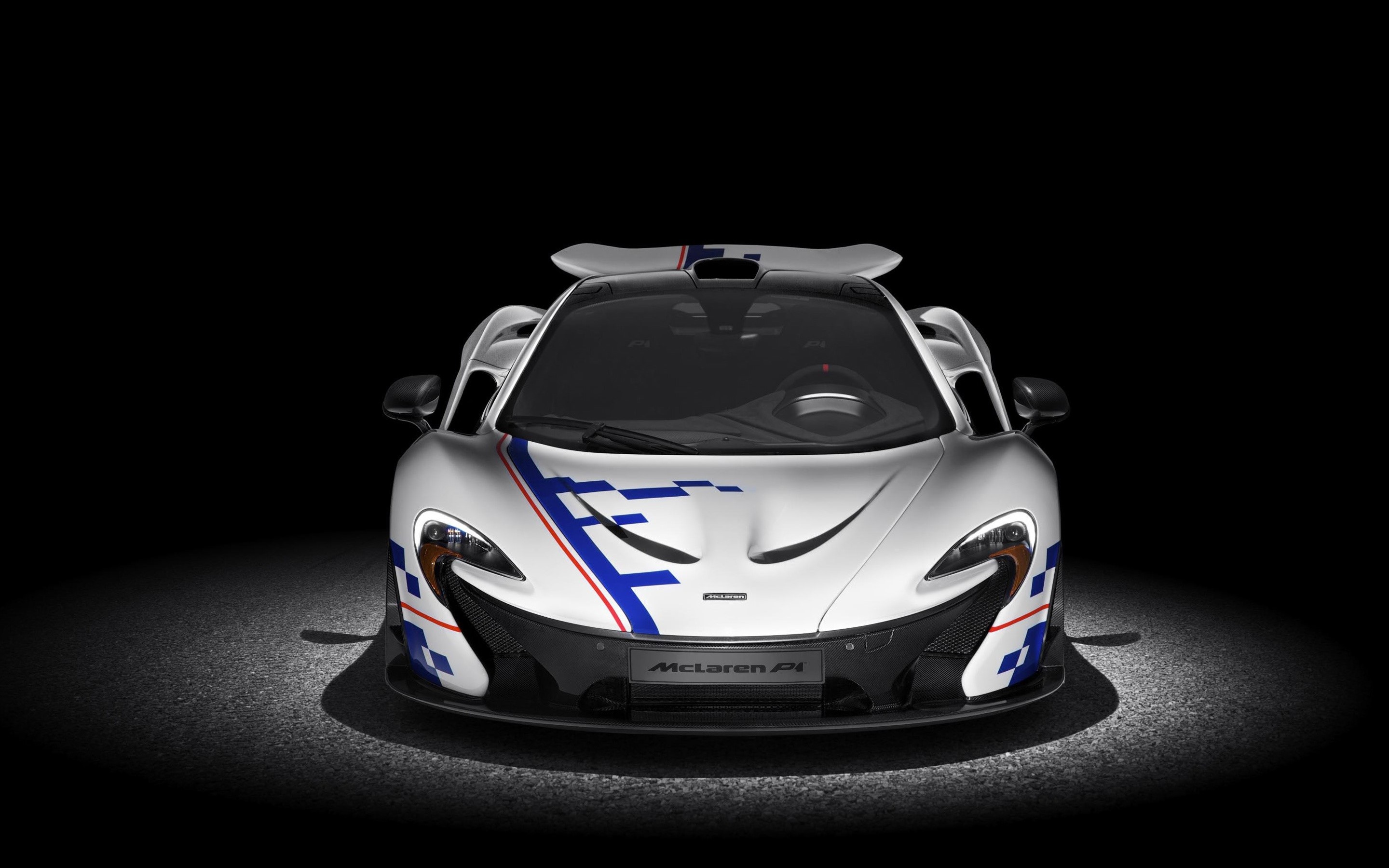 White McLaren P1 supercar with racing livery HD Wallpaper
