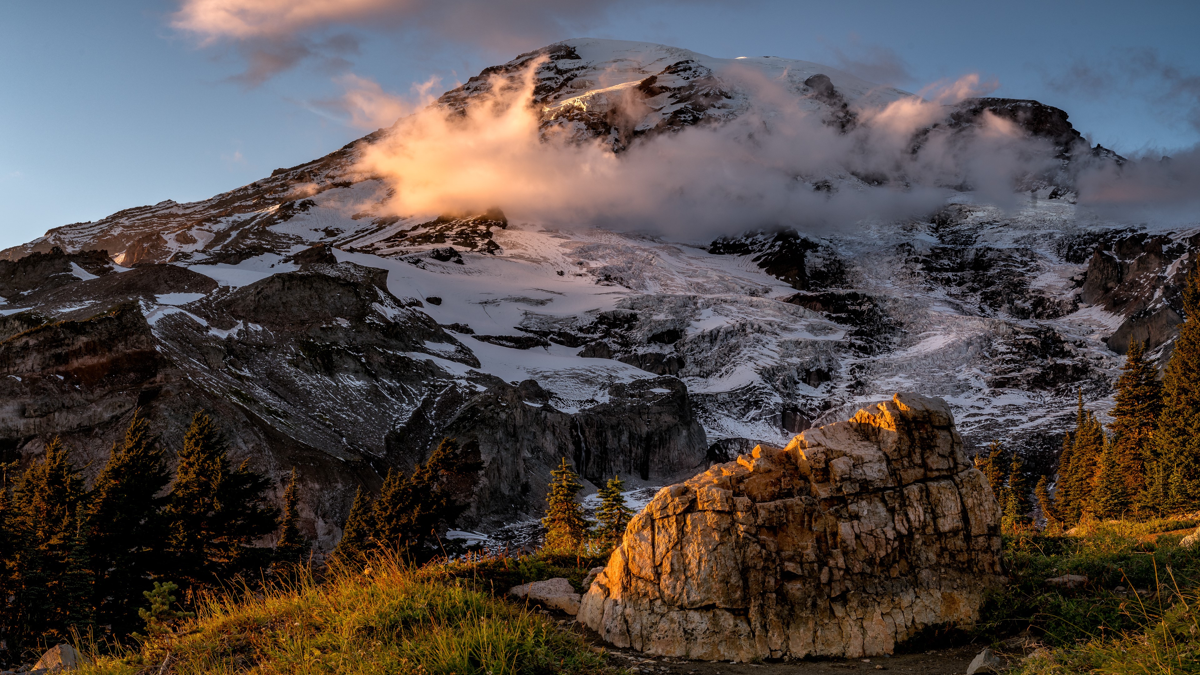 4K landscape of Mount Rainier with clouds and rocks HD Wallpaper