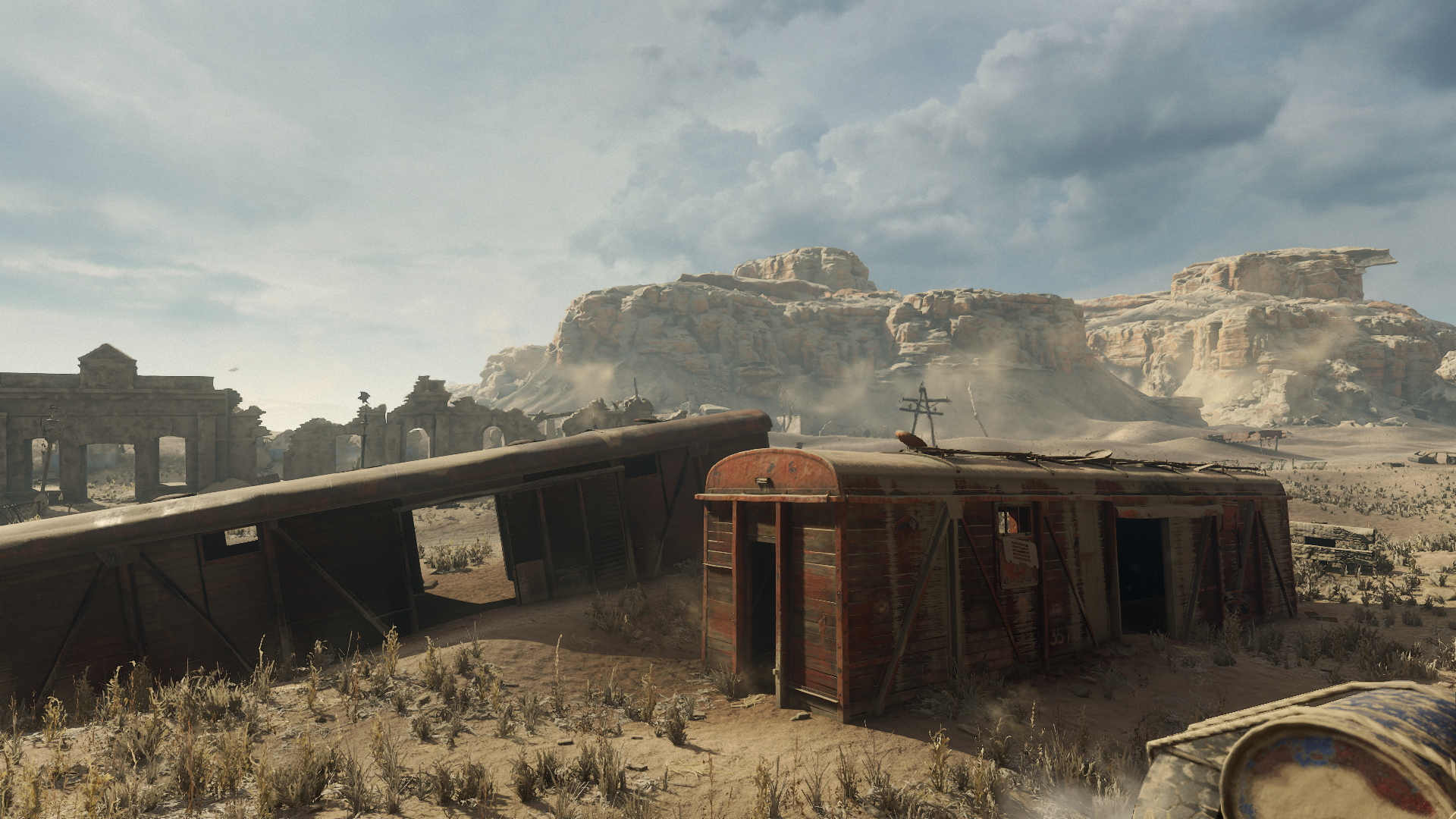 Ruined train cars in a desert landscape from Metro Exodus HD Wallpaper