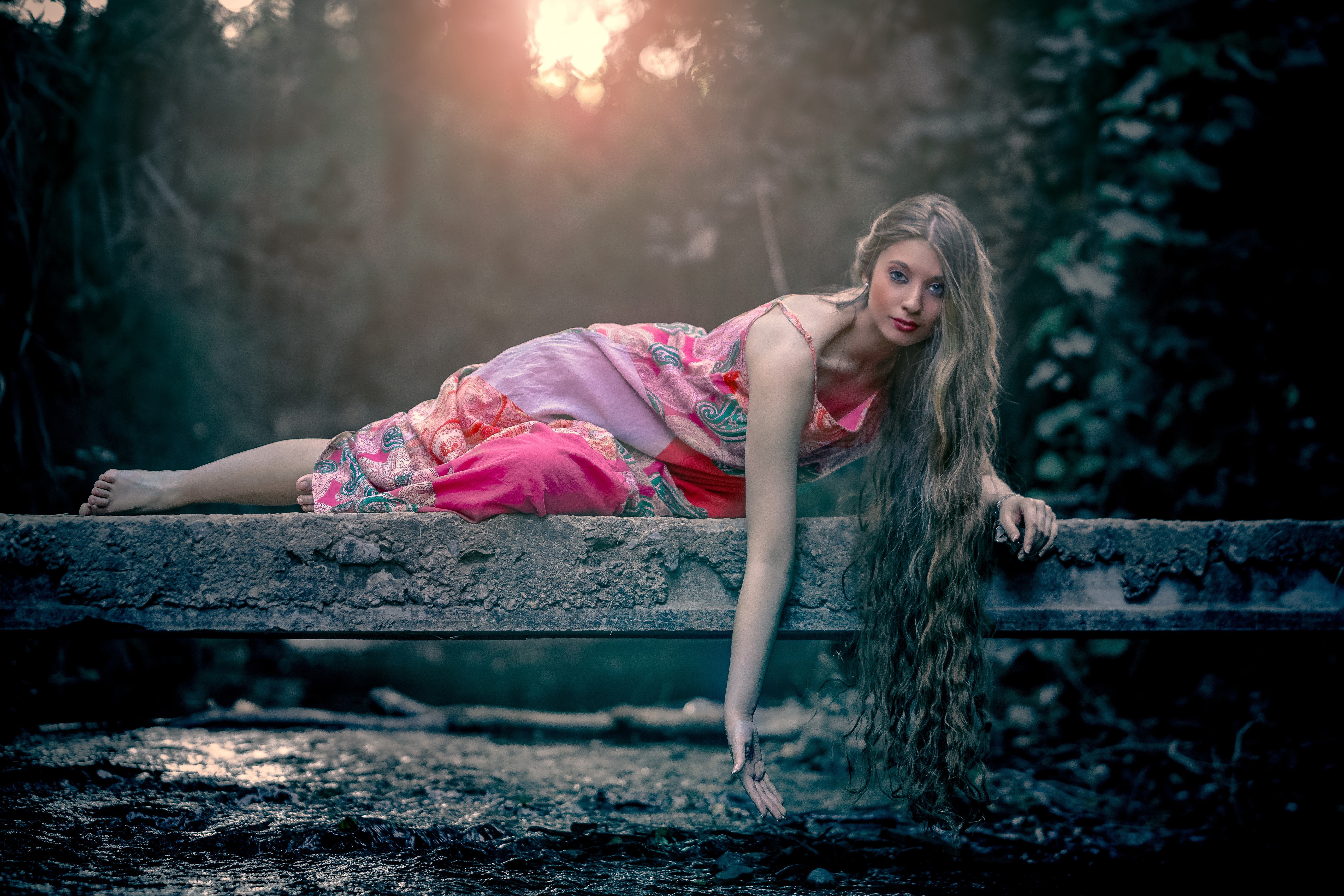 Woman in Pink Dress Lying on a Ledge HD Wallpaper