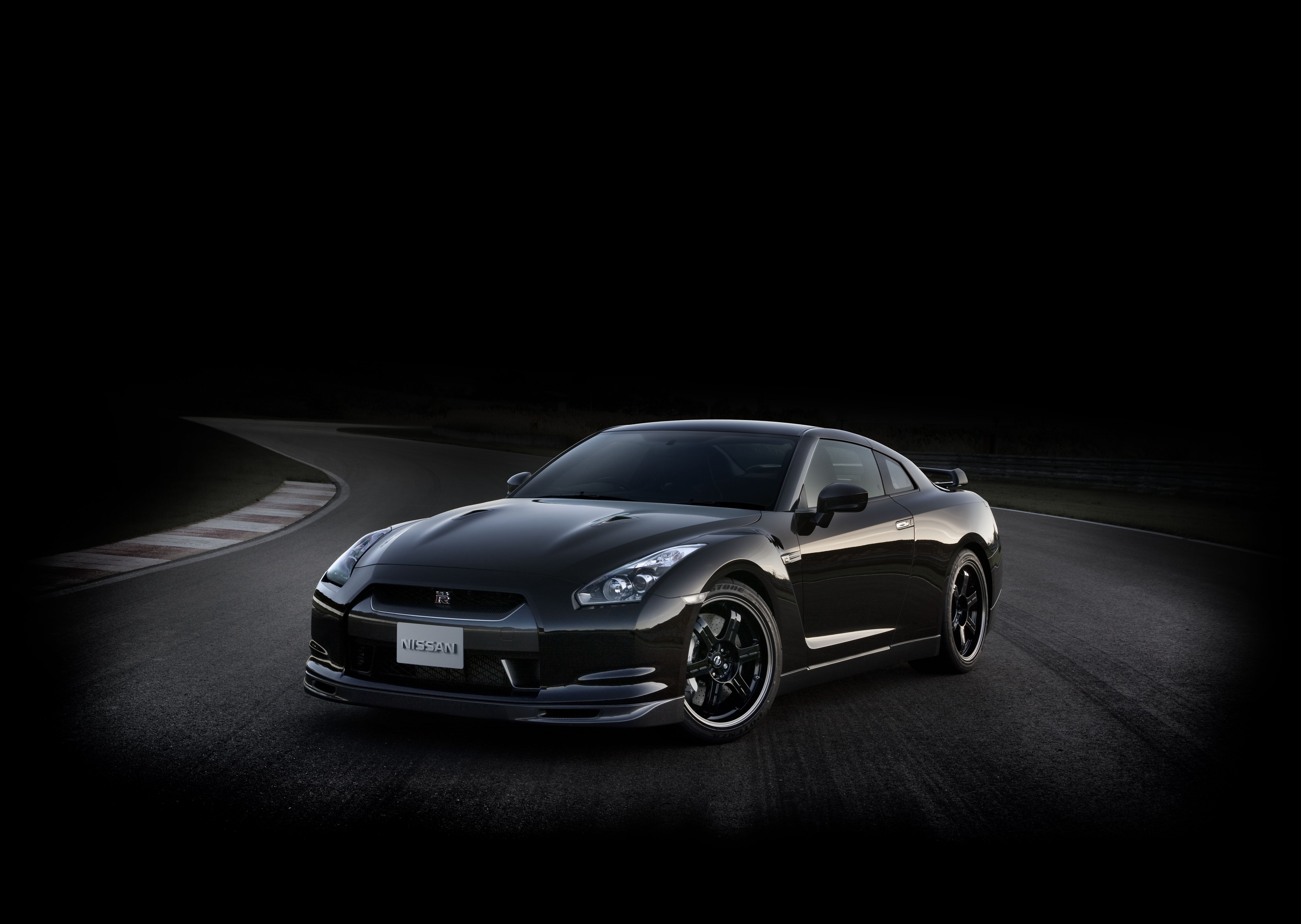 Nissan GT-R on a Racetrack HD Wallpaper