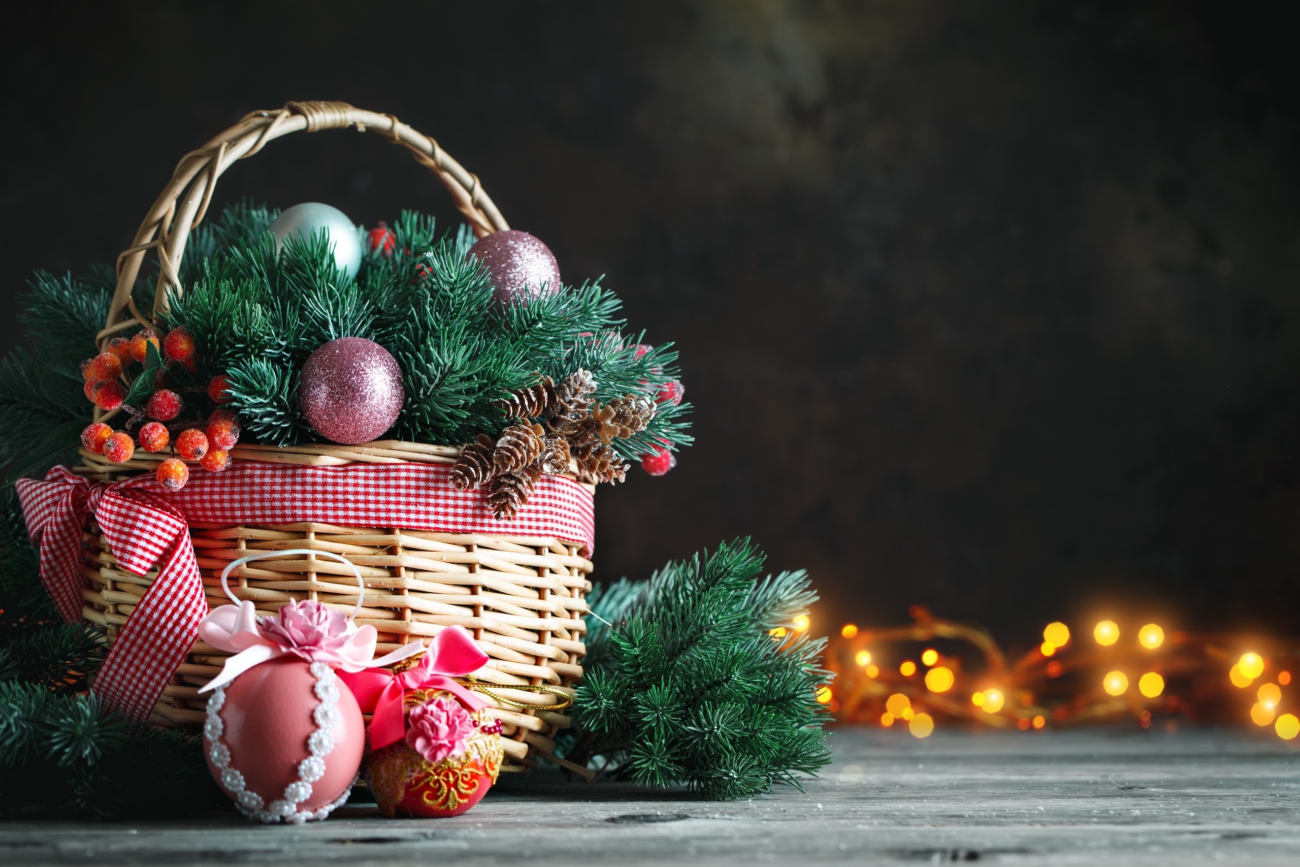 Christmas basket with ornaments and pine branches HD Wallpaper