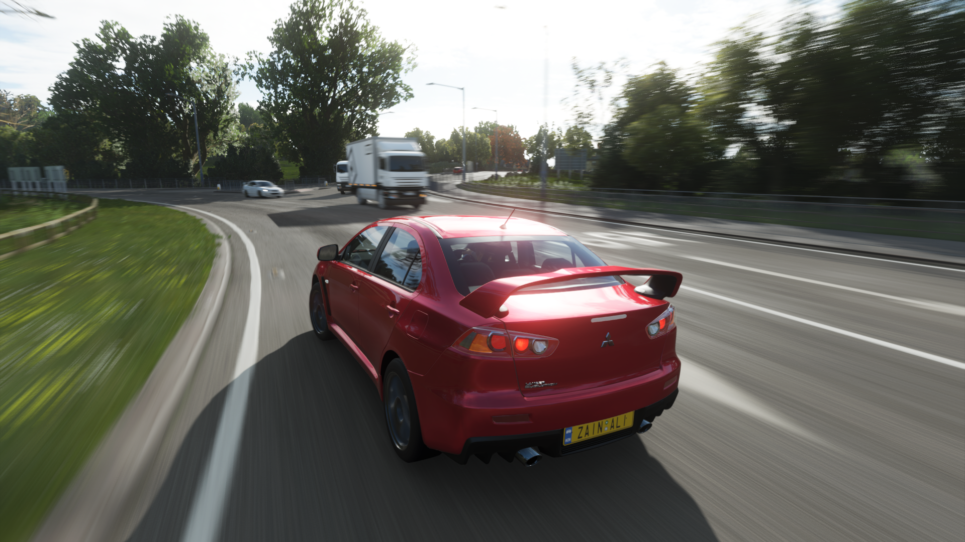 Red Mitsubishi Lancer Evolution X on a highway HD Wallpaper