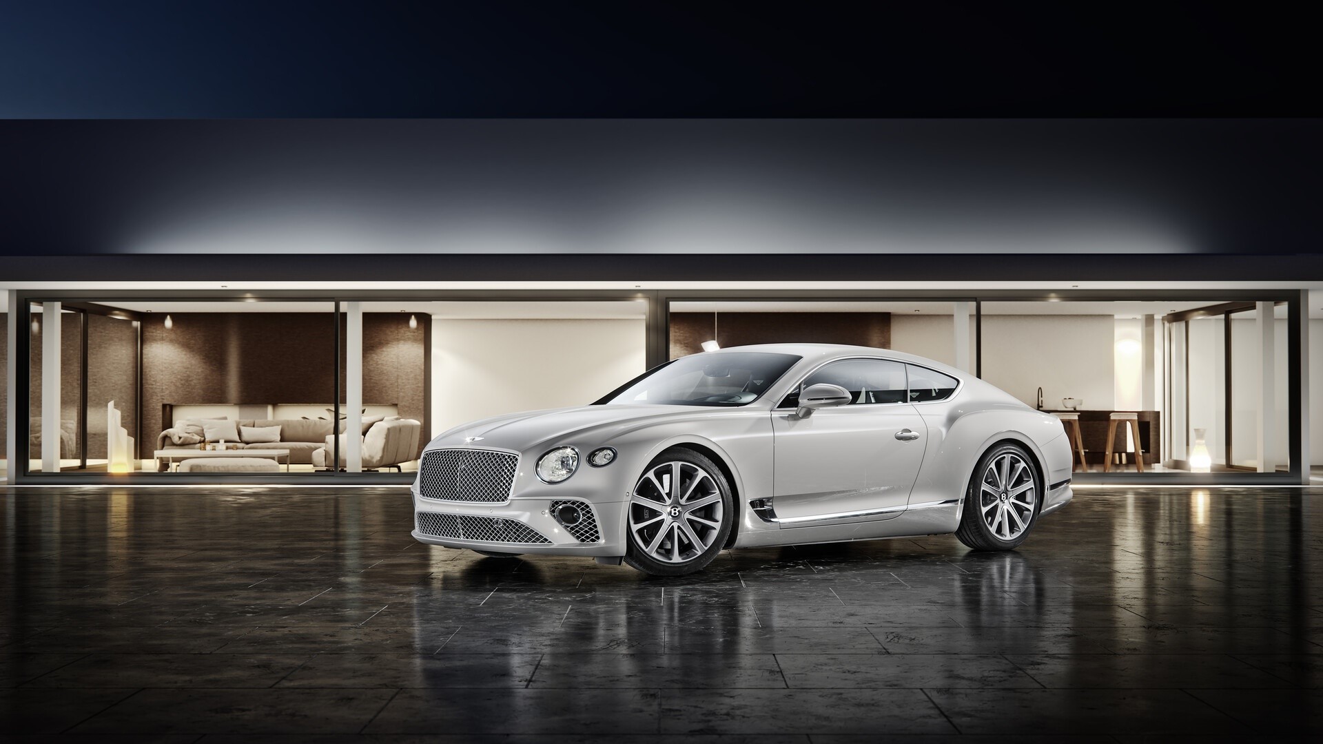 Silver Bentley Continental GT parked in front of a modern house HD Wallpaper