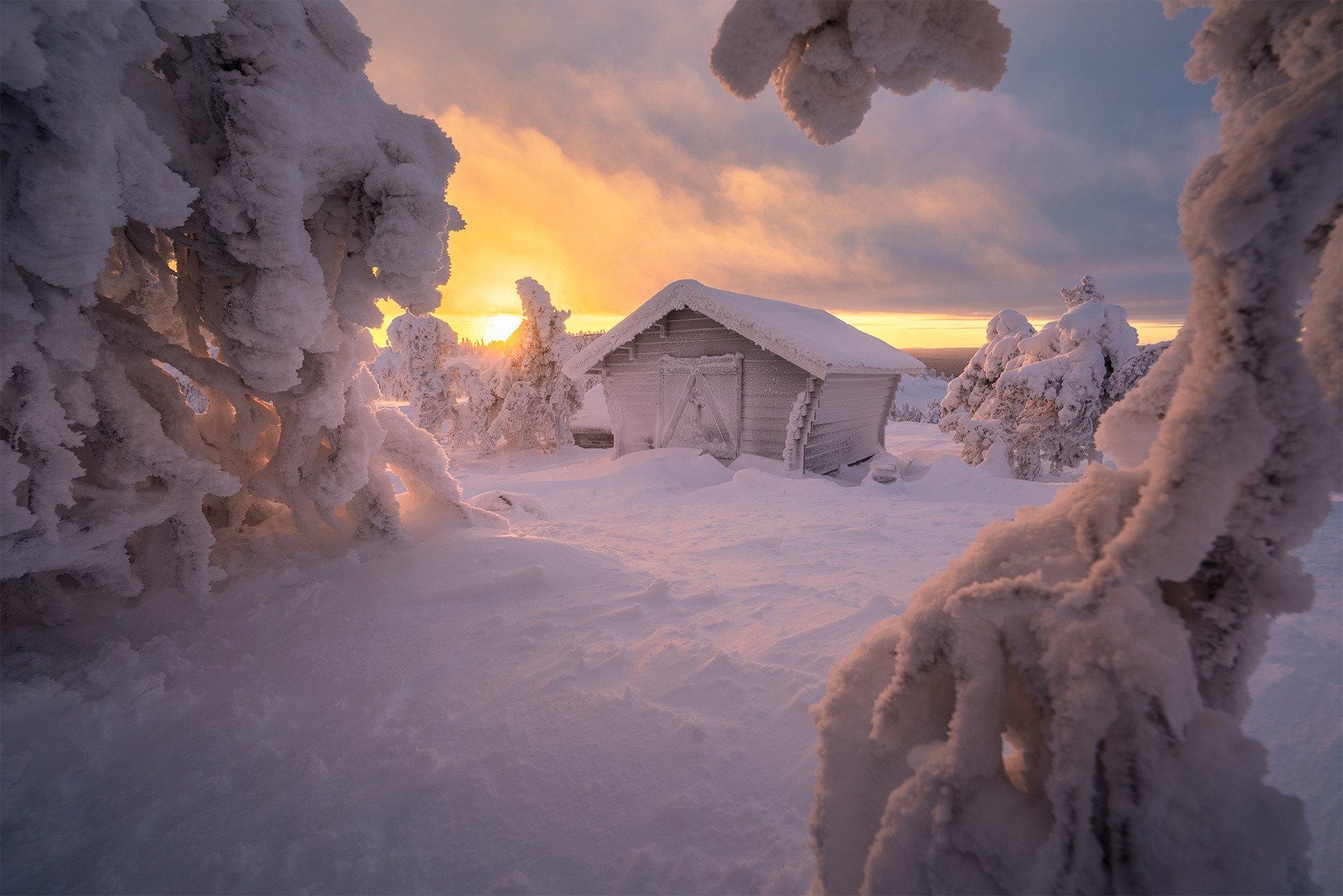 Snow-covered hut in winter landscape at sunset HD Wallpaper