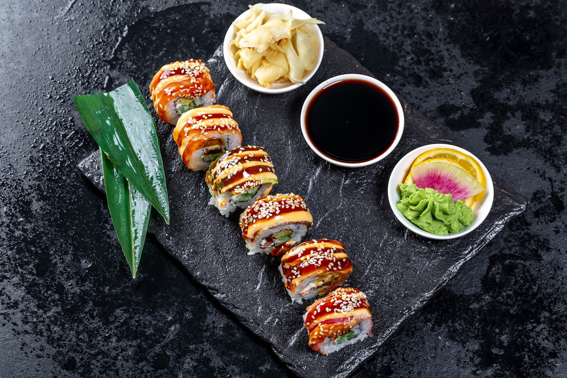 Sushi platter with eel, wasabi, soy sauce, and ginger HD Wallpaper