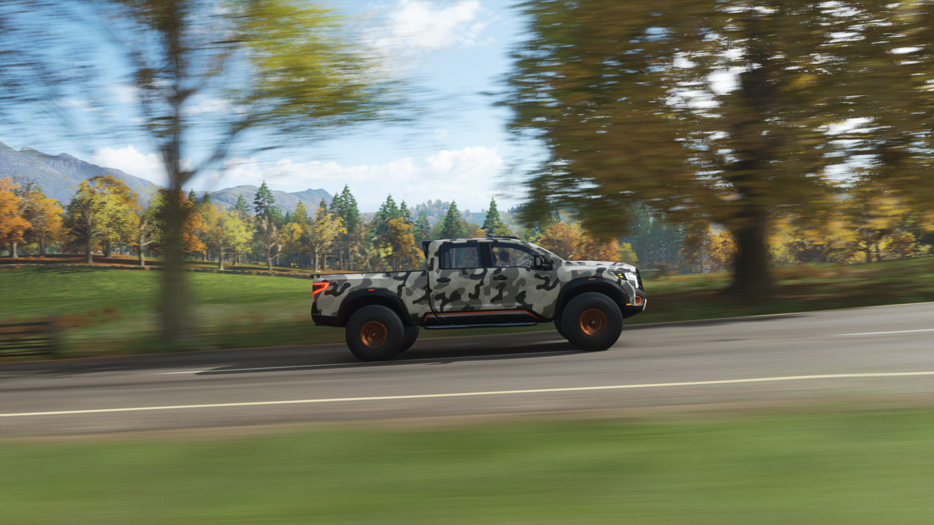 Camouflaged pickup truck driving on a road in Forza Horizon 4 HD Wallpaper