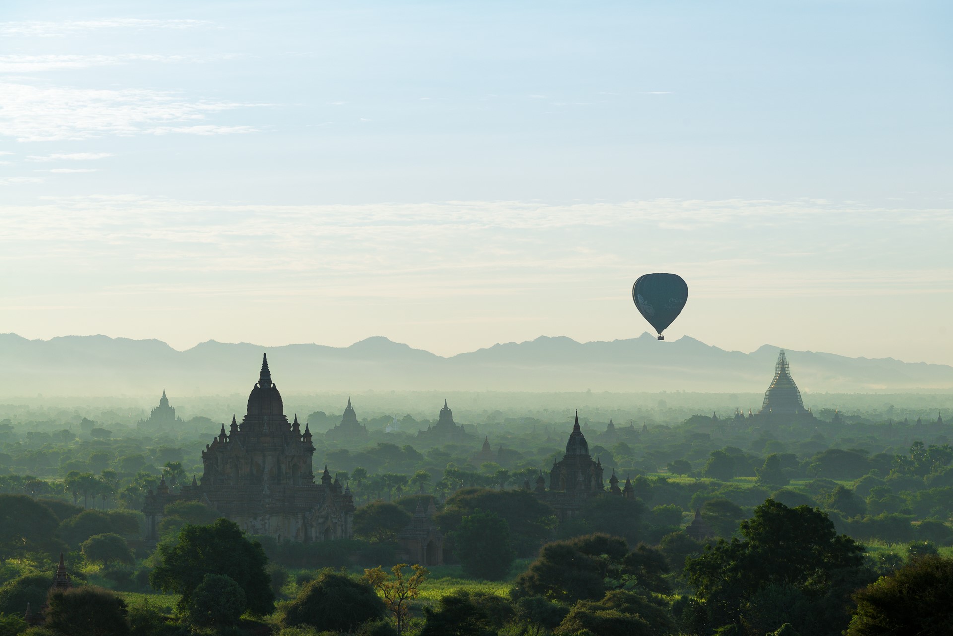 Hot air balloon over ancient temples in Bagan, Myanmar HD Wallpaper
