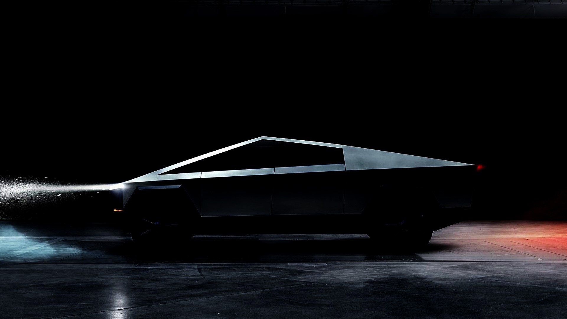 Tesla Cybertruck in a dark, futuristic setting HD Wallpaper