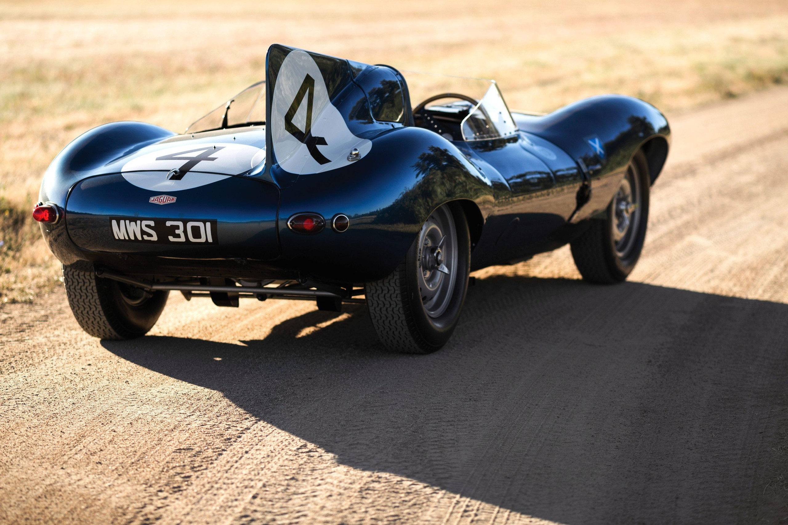 Jaguar D-Type race car with number 4 HD Wallpaper