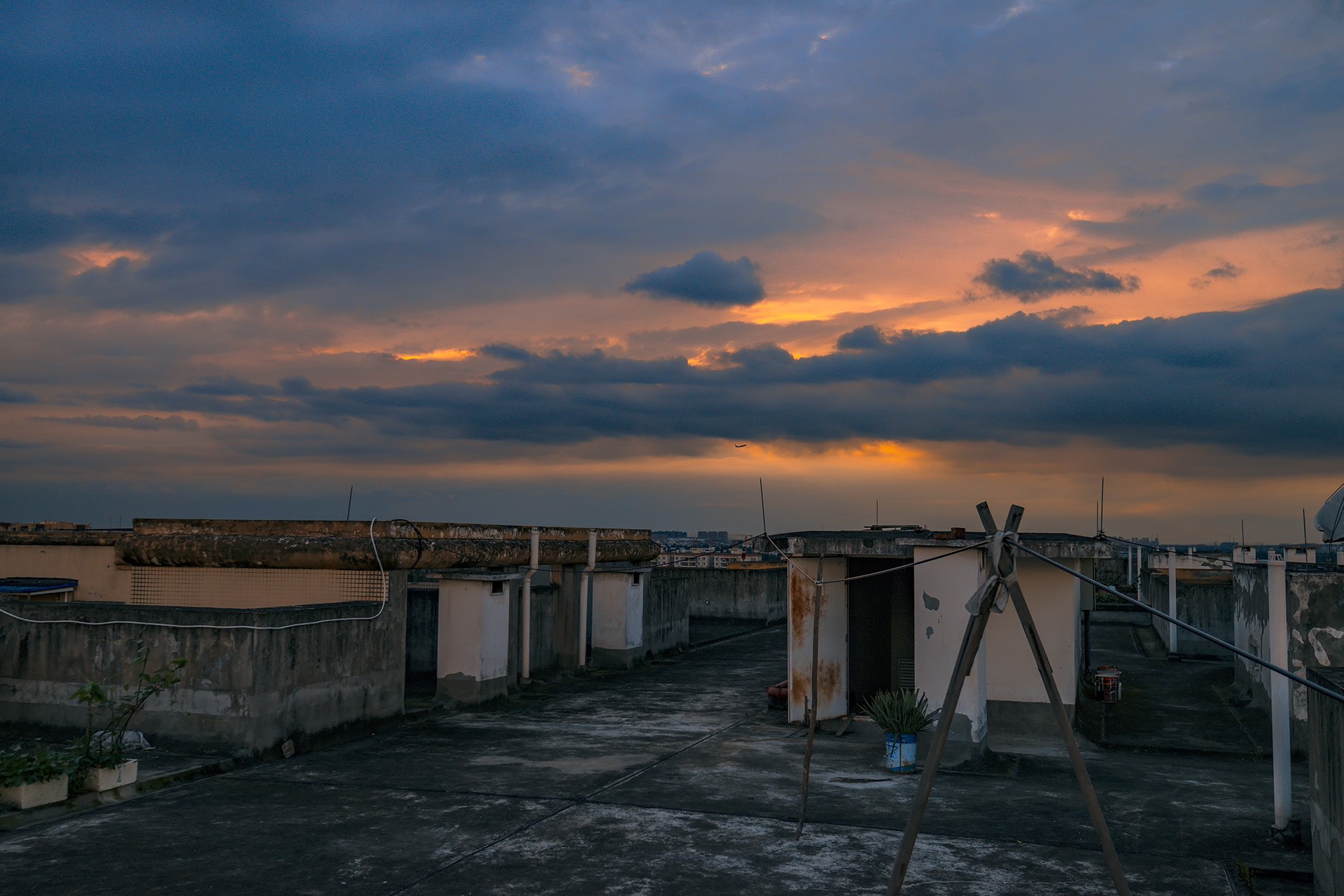Rooftop at sunset with clouds HD Wallpaper