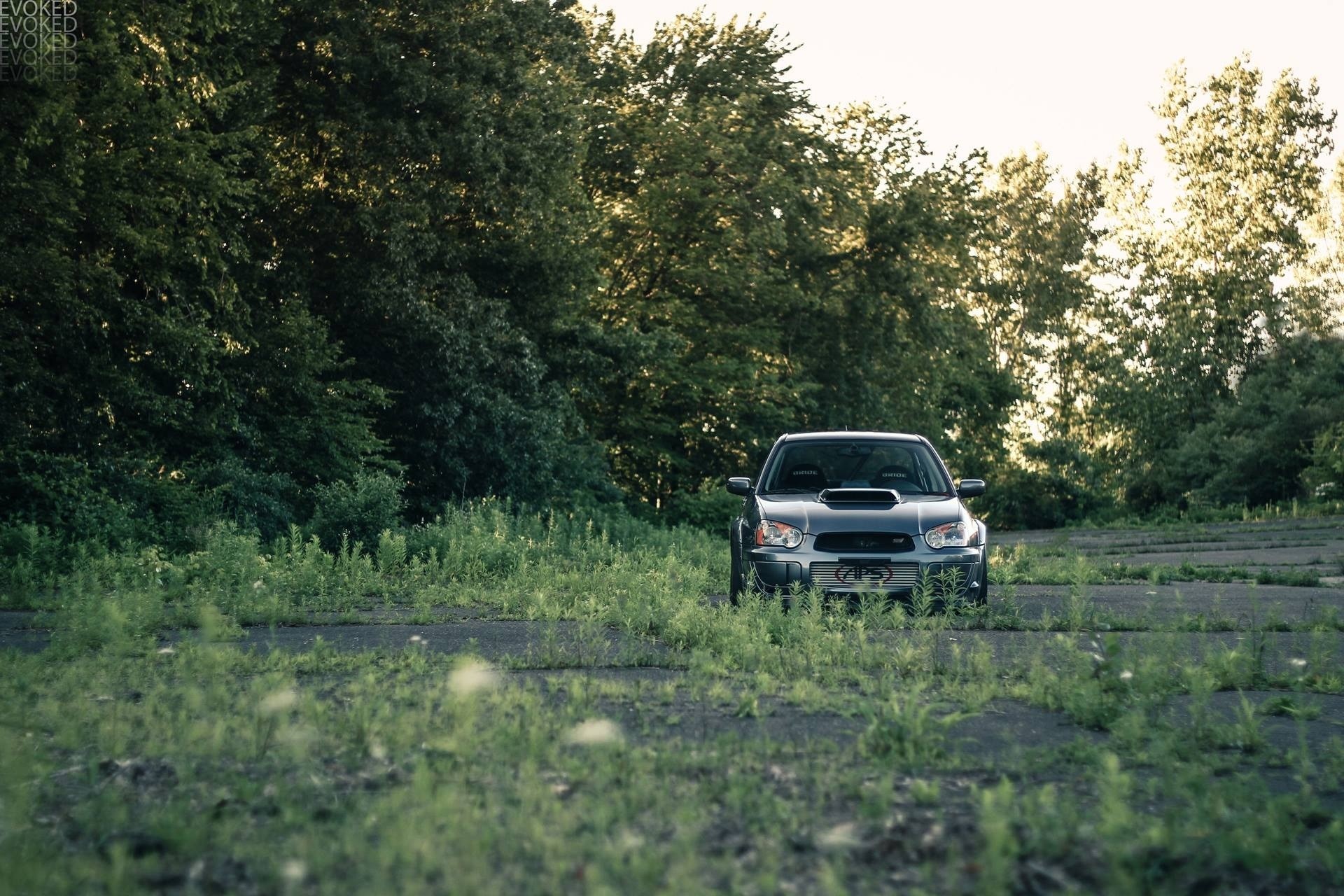 Subaru WRX STI Blobeye Impreza parked in overgrown lot HD Wallpaper
