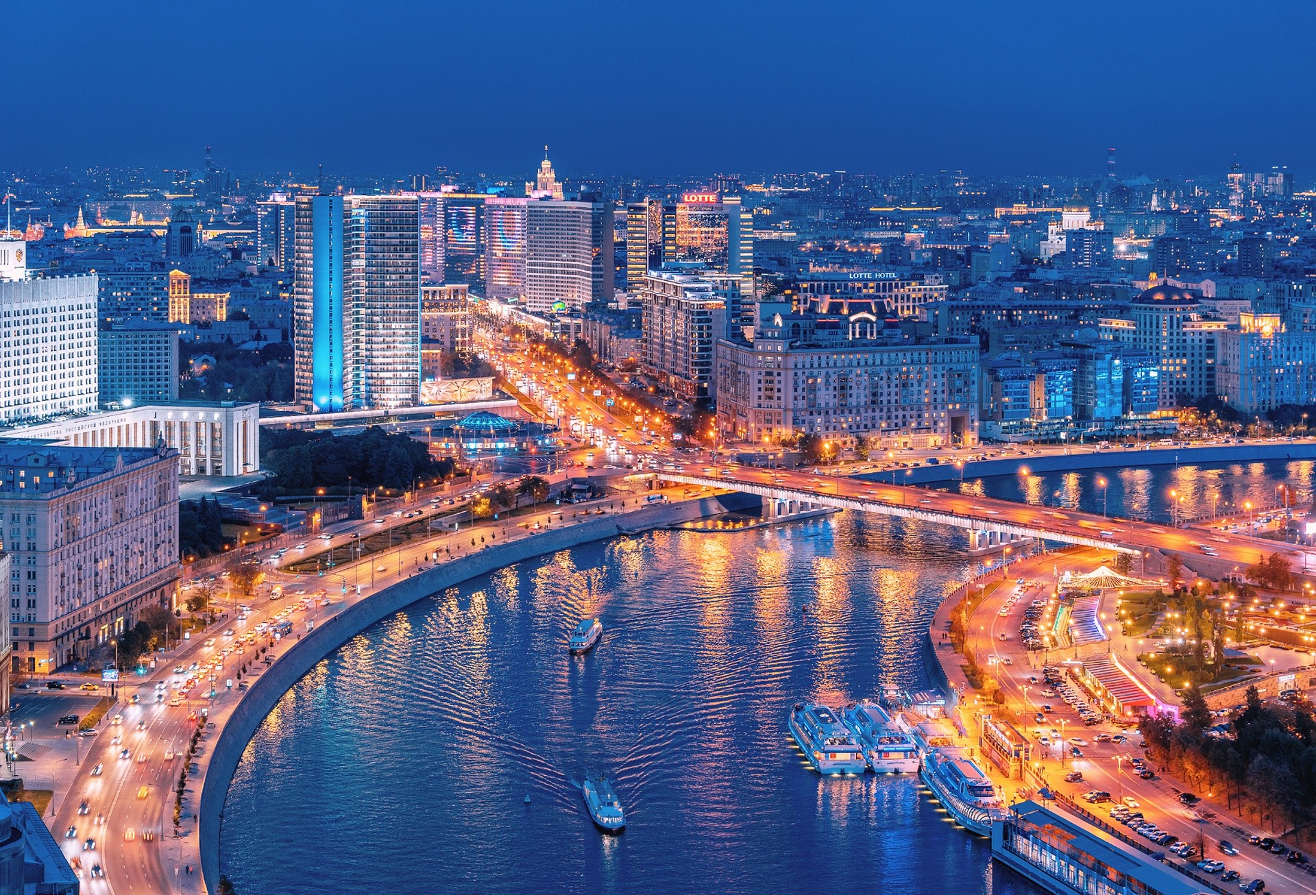 Moscow cityscape at night with river and bridge HD Wallpaper