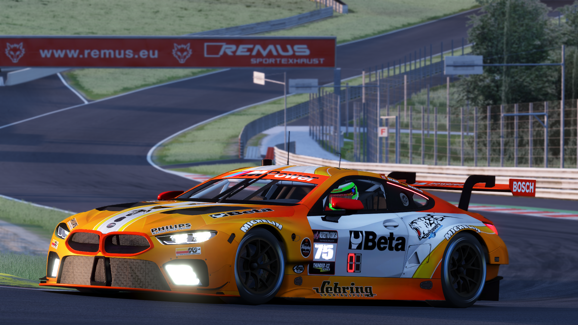 BMW M8 GTE race car on a track HD Wallpaper