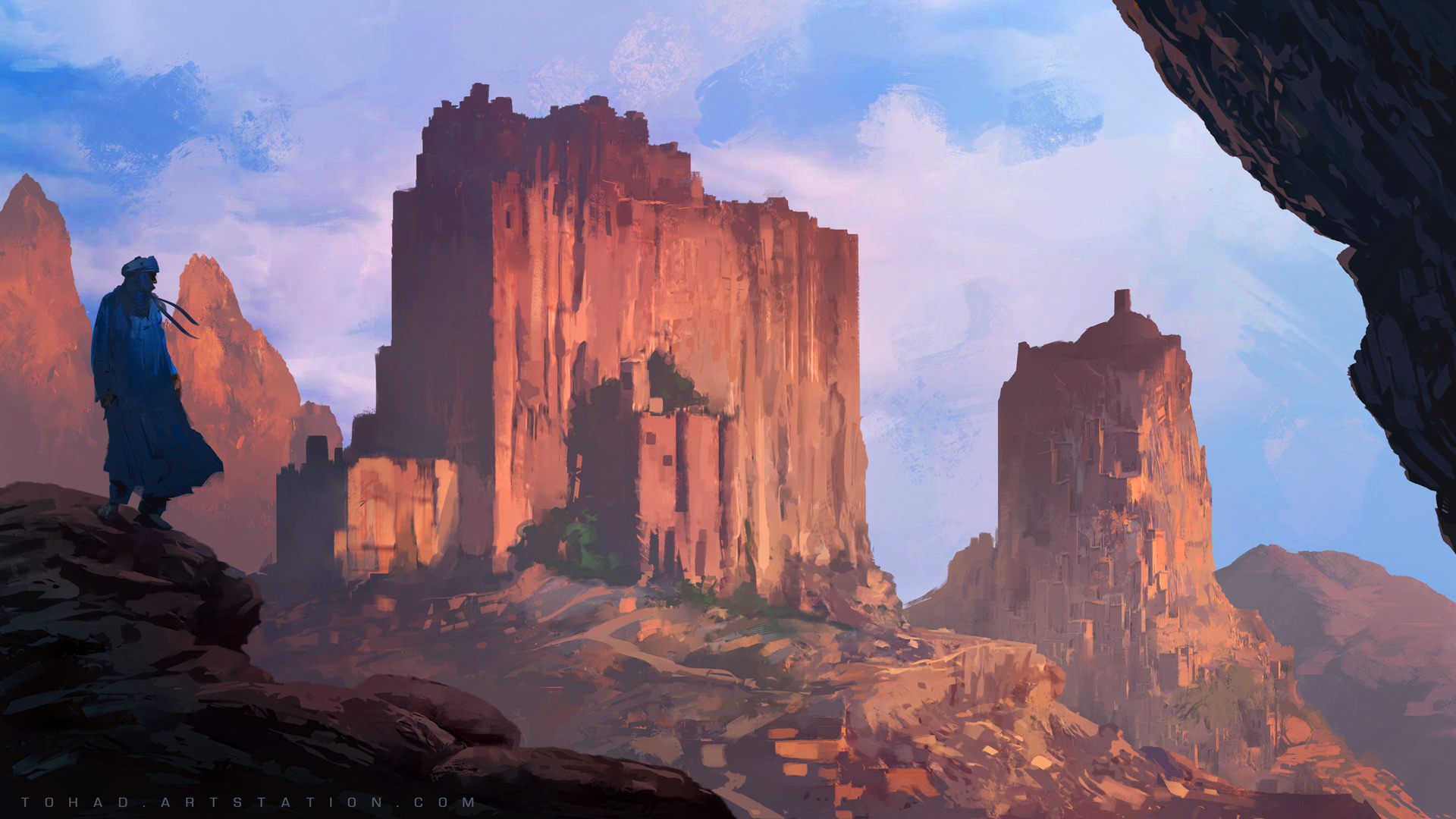 Man in blue robes overlooking ancient desert city ruins HD Wallpaper