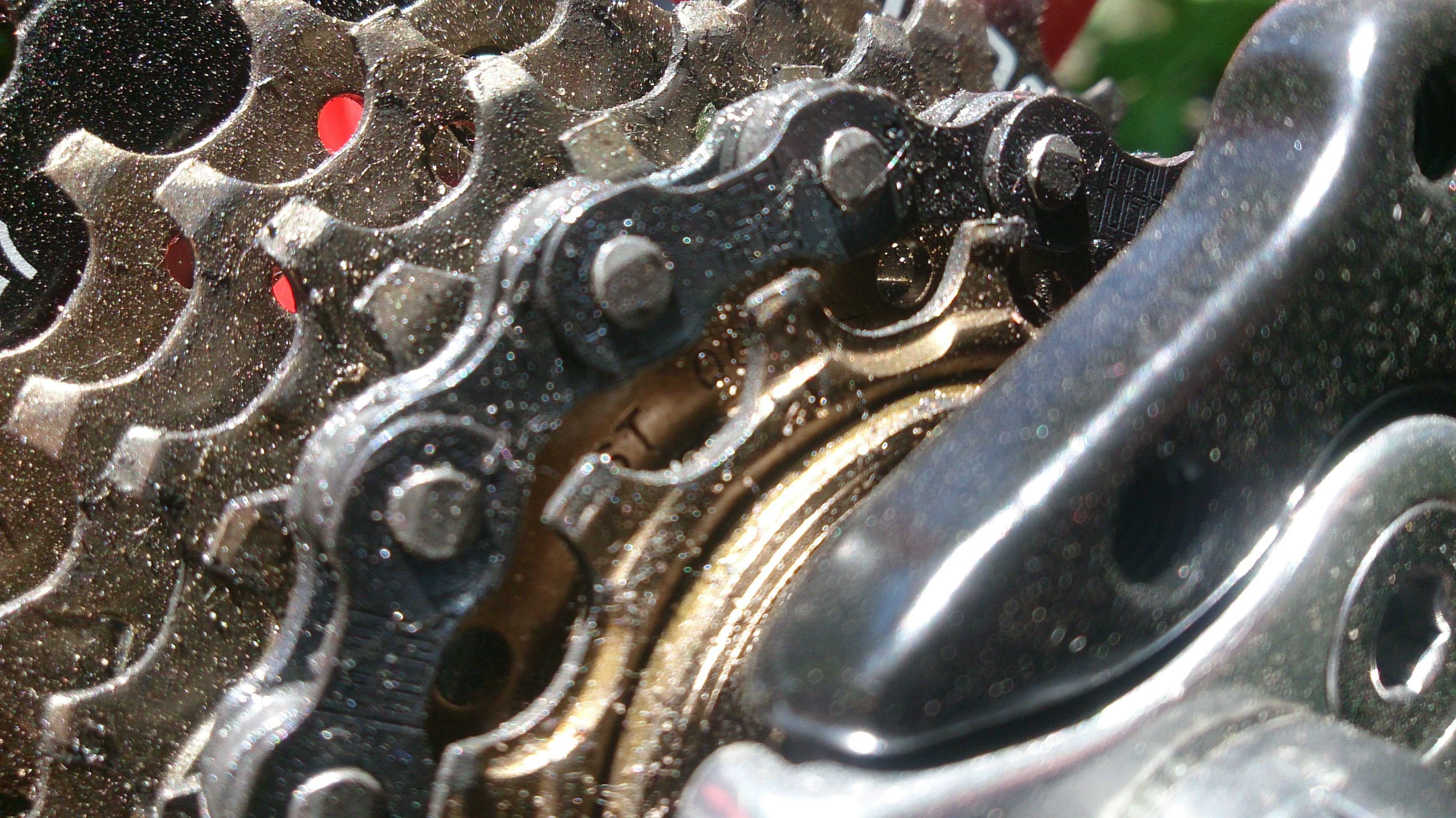 Close-up of a bicycle chain and gears HD Wallpaper