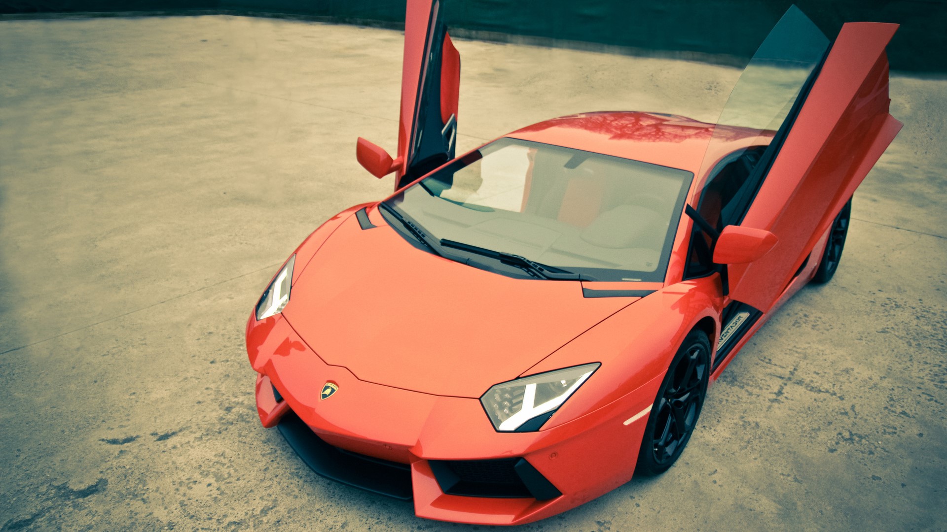 Orange Lamborghini Aventador with doors open HD Wallpaper
