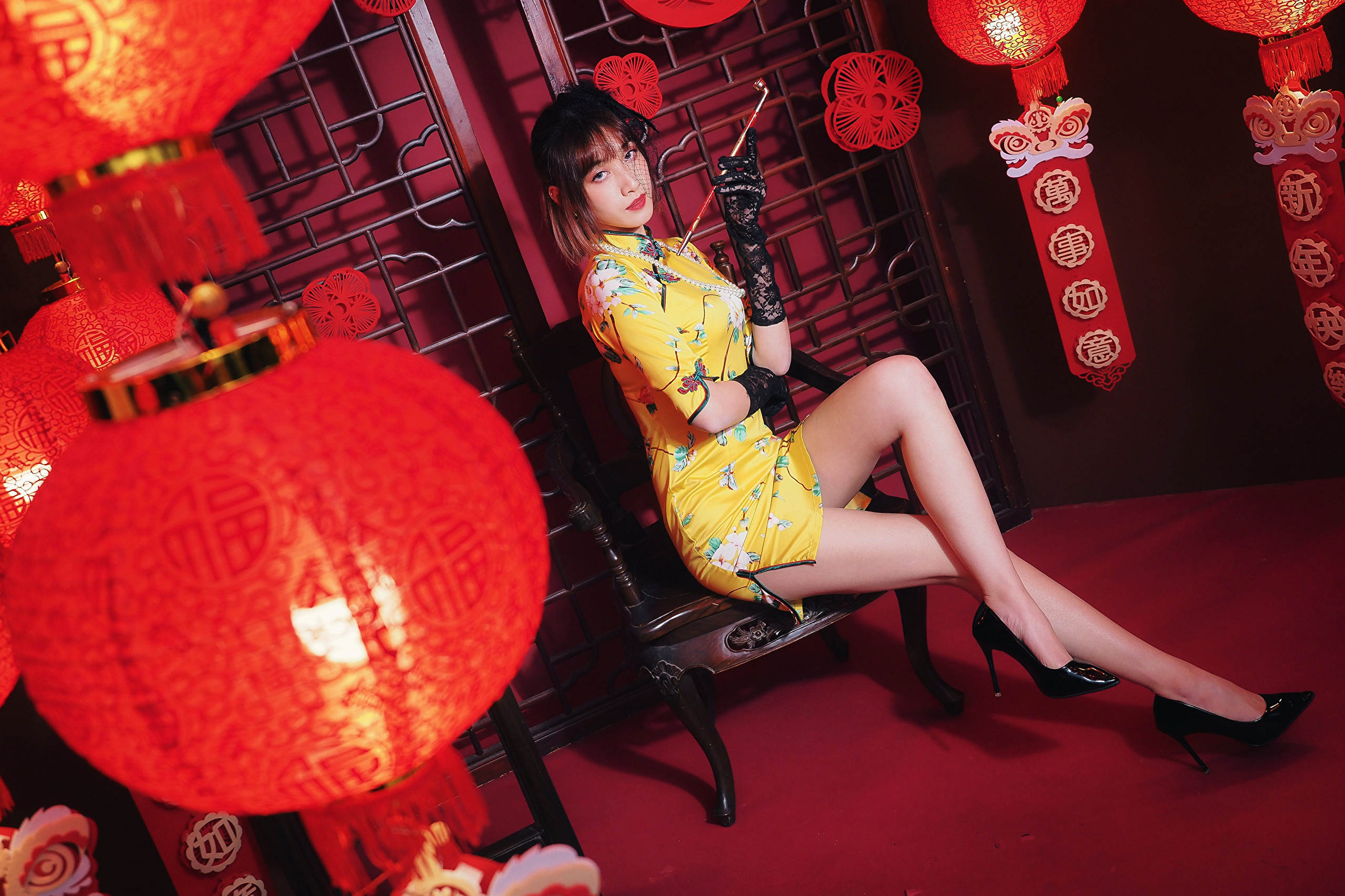 Woman in Yellow Cheongsam with Red Lanterns HD Wallpaper