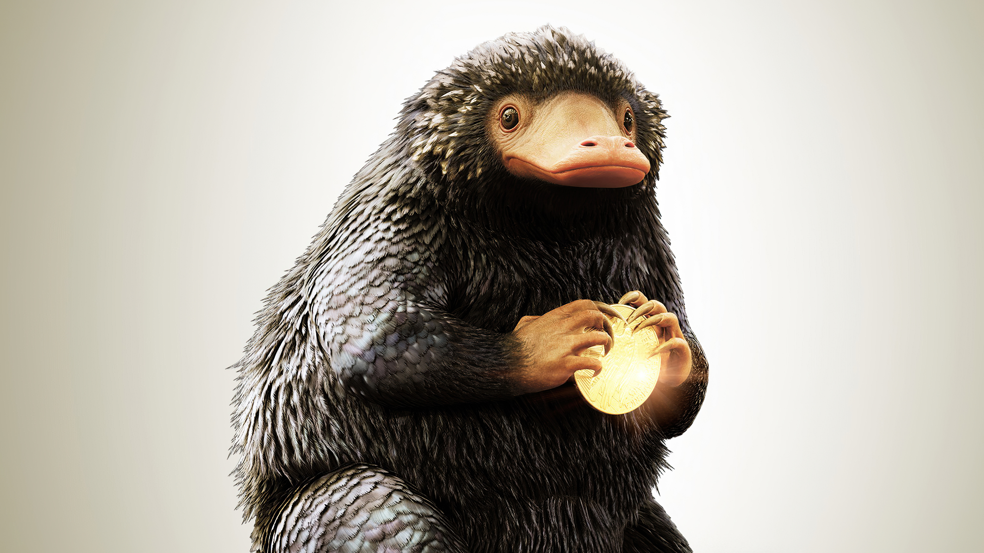 Niffler holding a golden object from Fantastic Beasts 4K HD Wallpaper