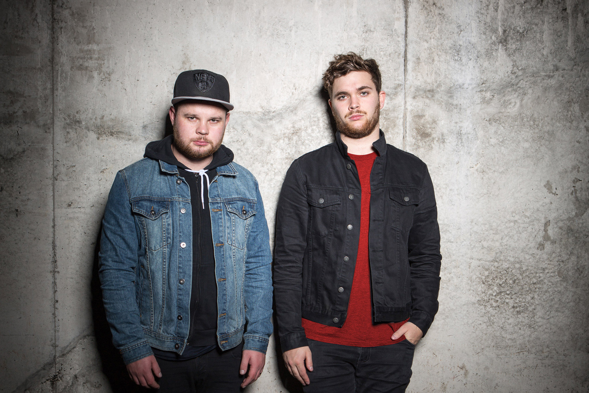 Royal Blood duo standing against a concrete wall HD Wallpaper