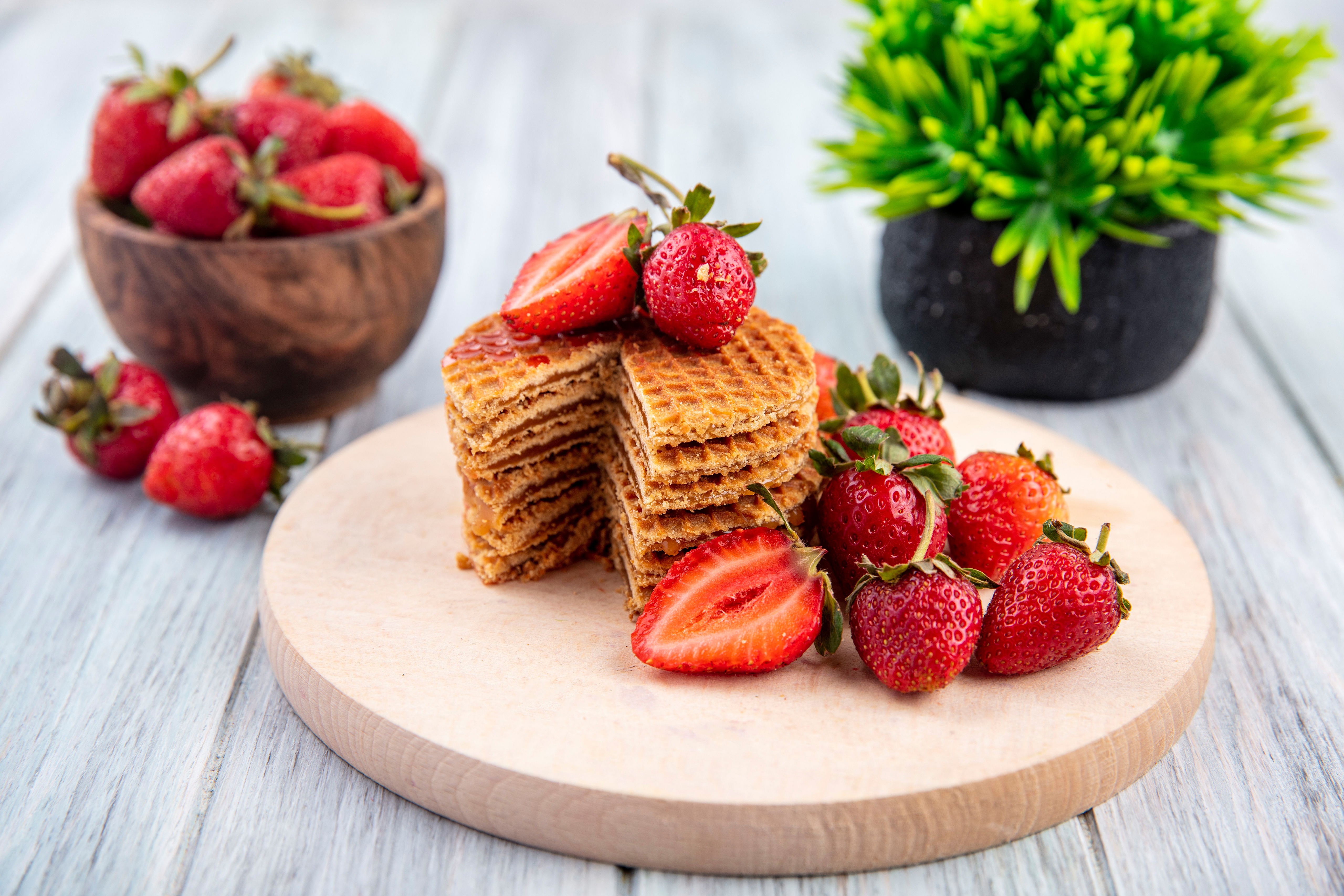 Waffle stack with strawberries and a bowl of strawberries HD Wallpaper