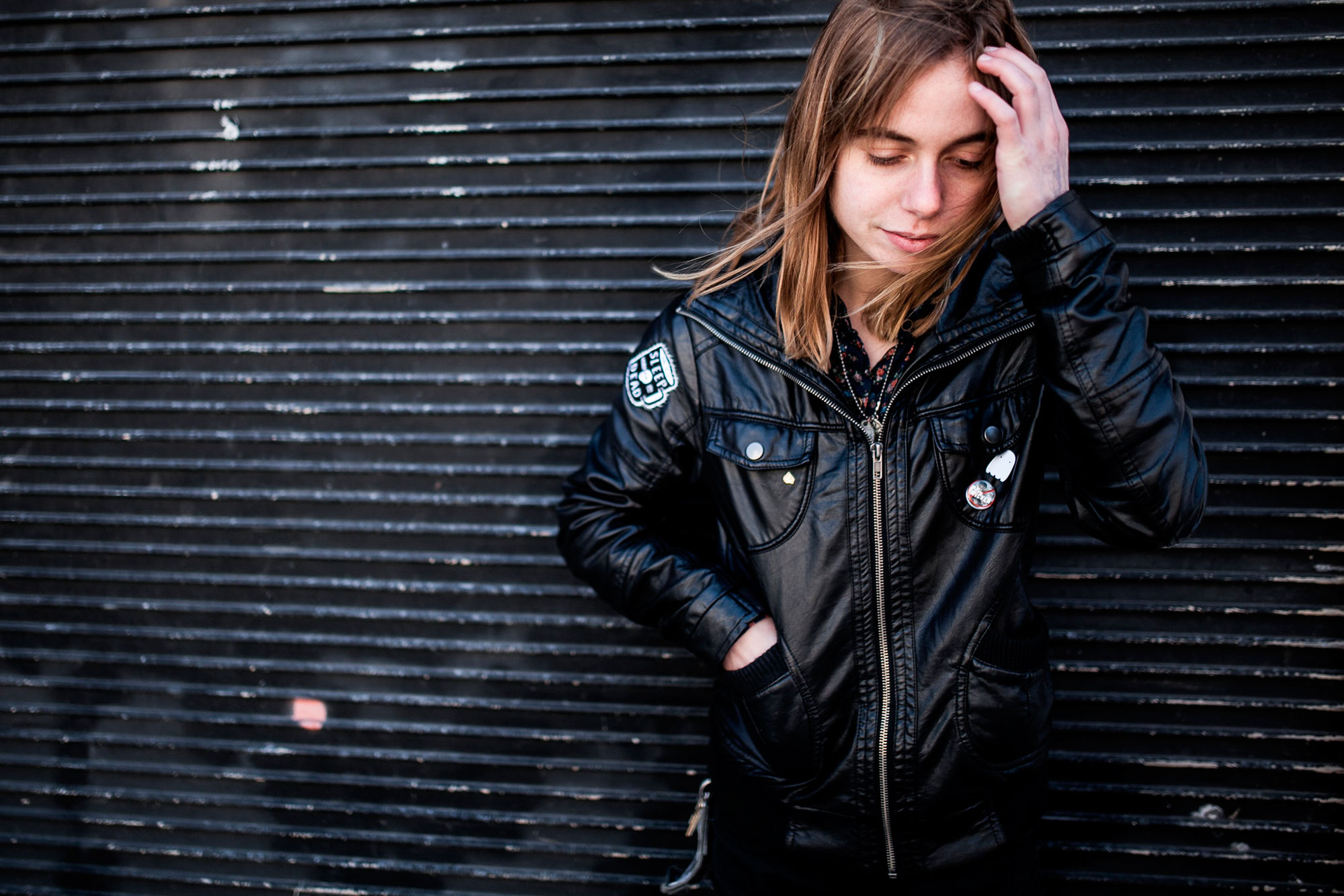 Julien Baker in a black leather jacket HD Wallpaper