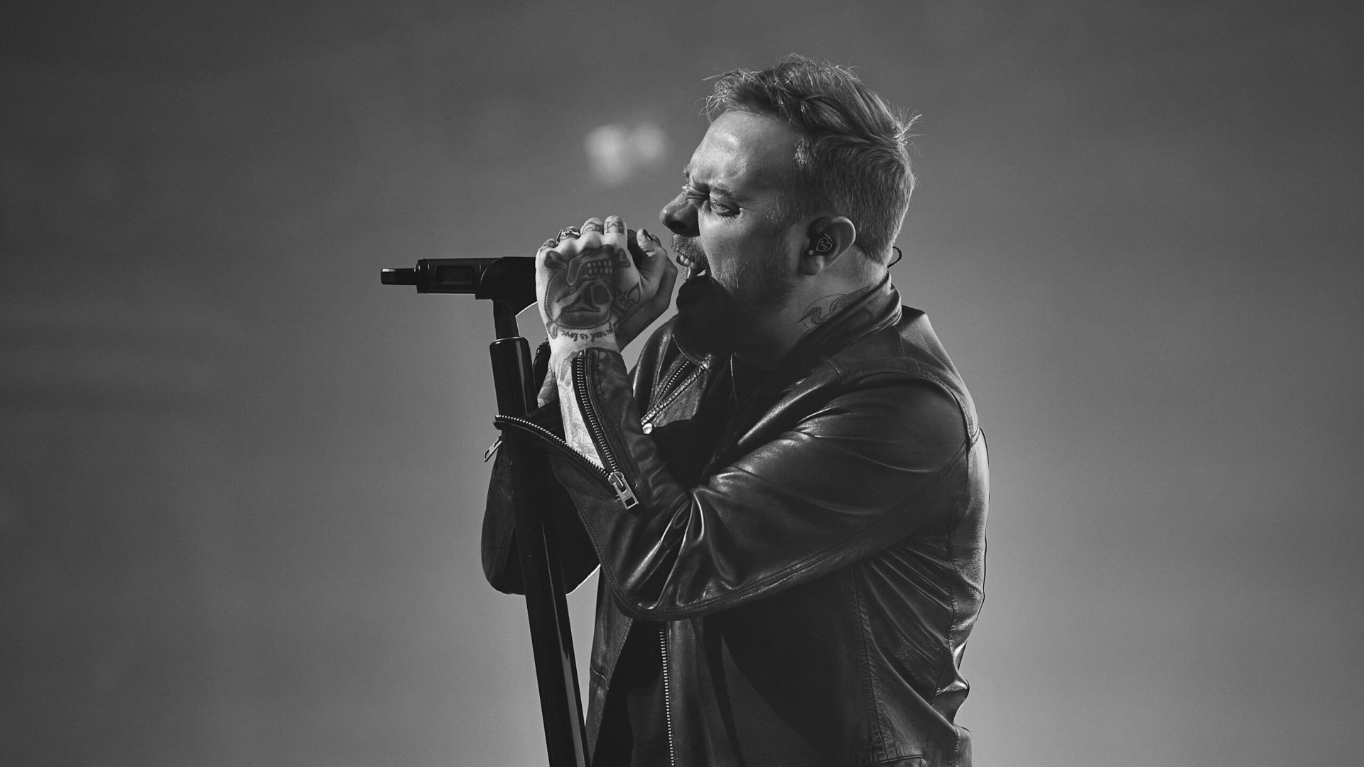 Architects singer Sam Carter performing live HD Wallpaper