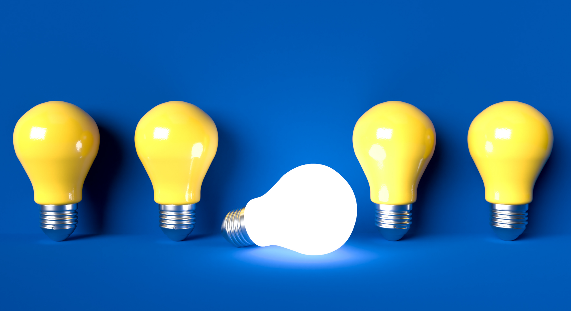 One glowing light bulb among four yellow ones HD Wallpaper