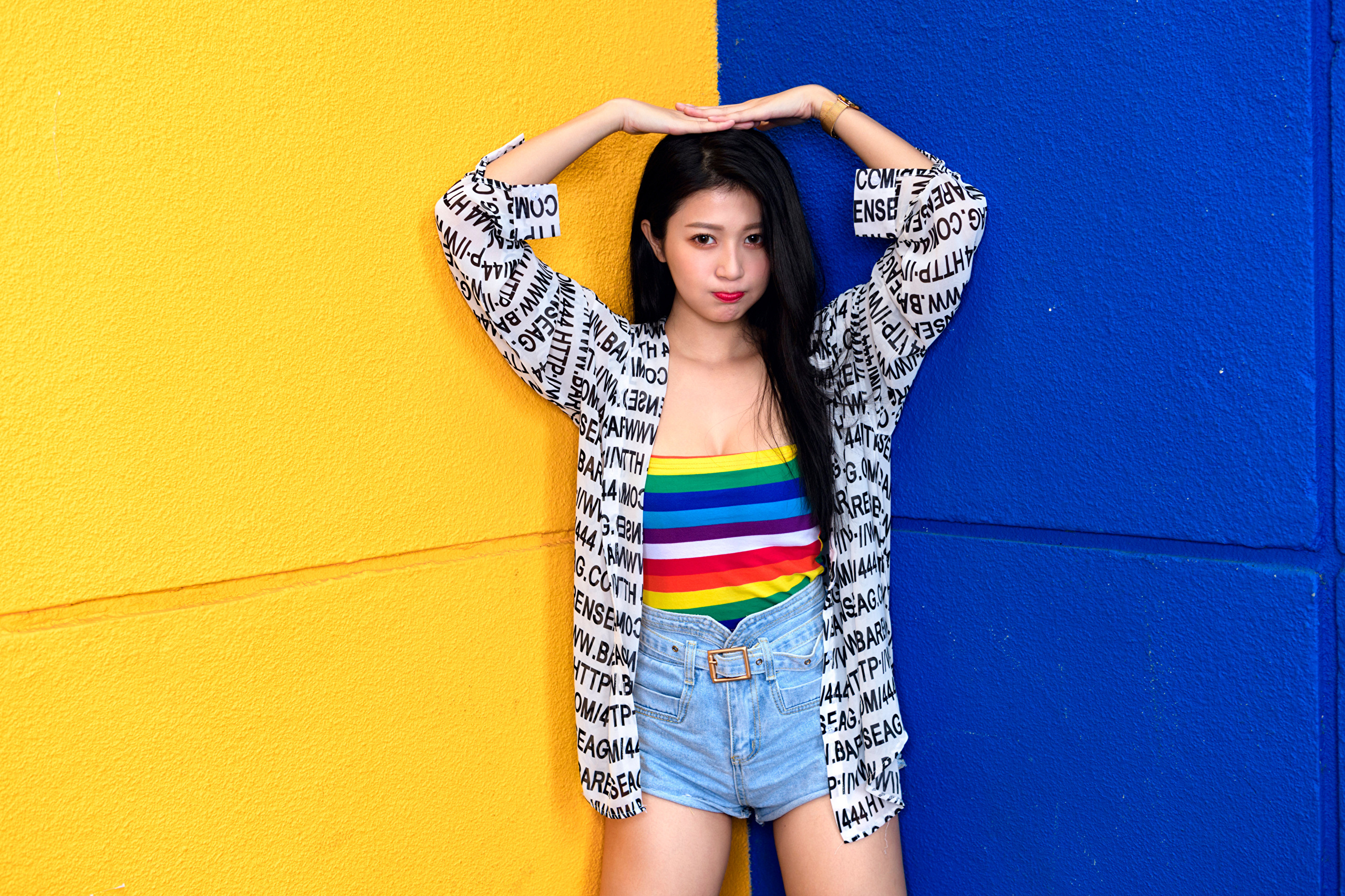 Woman in Rainbow Top and Denim Shorts HD Wallpaper
