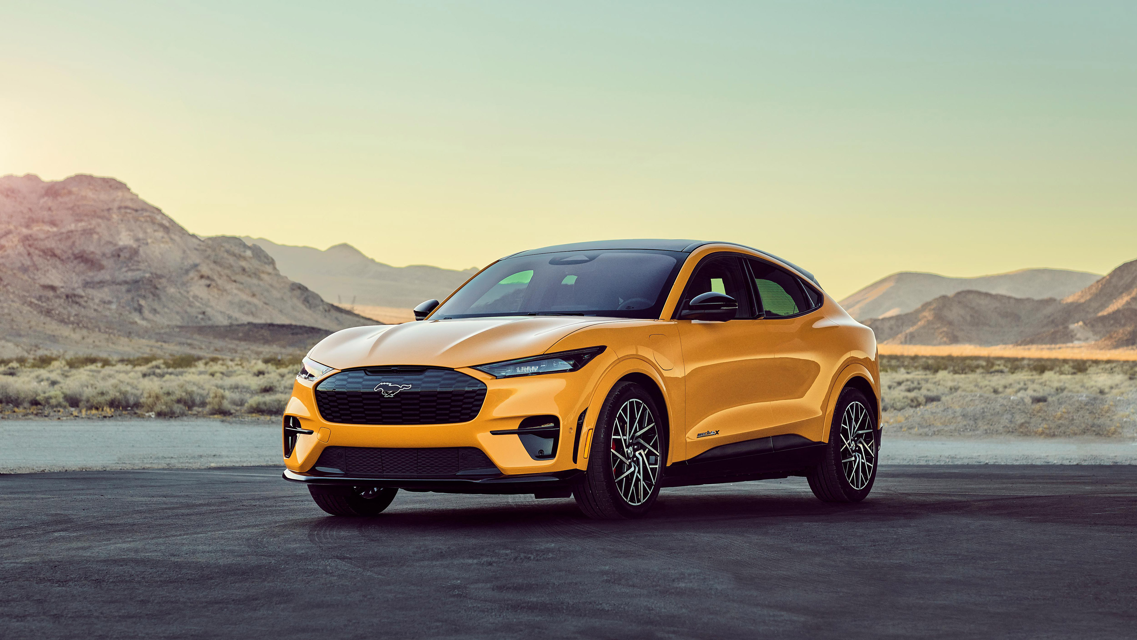 Yellow Ford Mustang Mach-E 4K in desert landscape HD Wallpaper