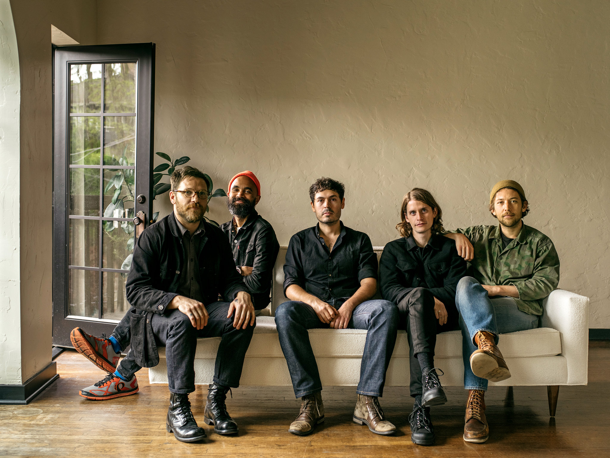 Fleet Foxes band members sitting on a couch HD Wallpaper