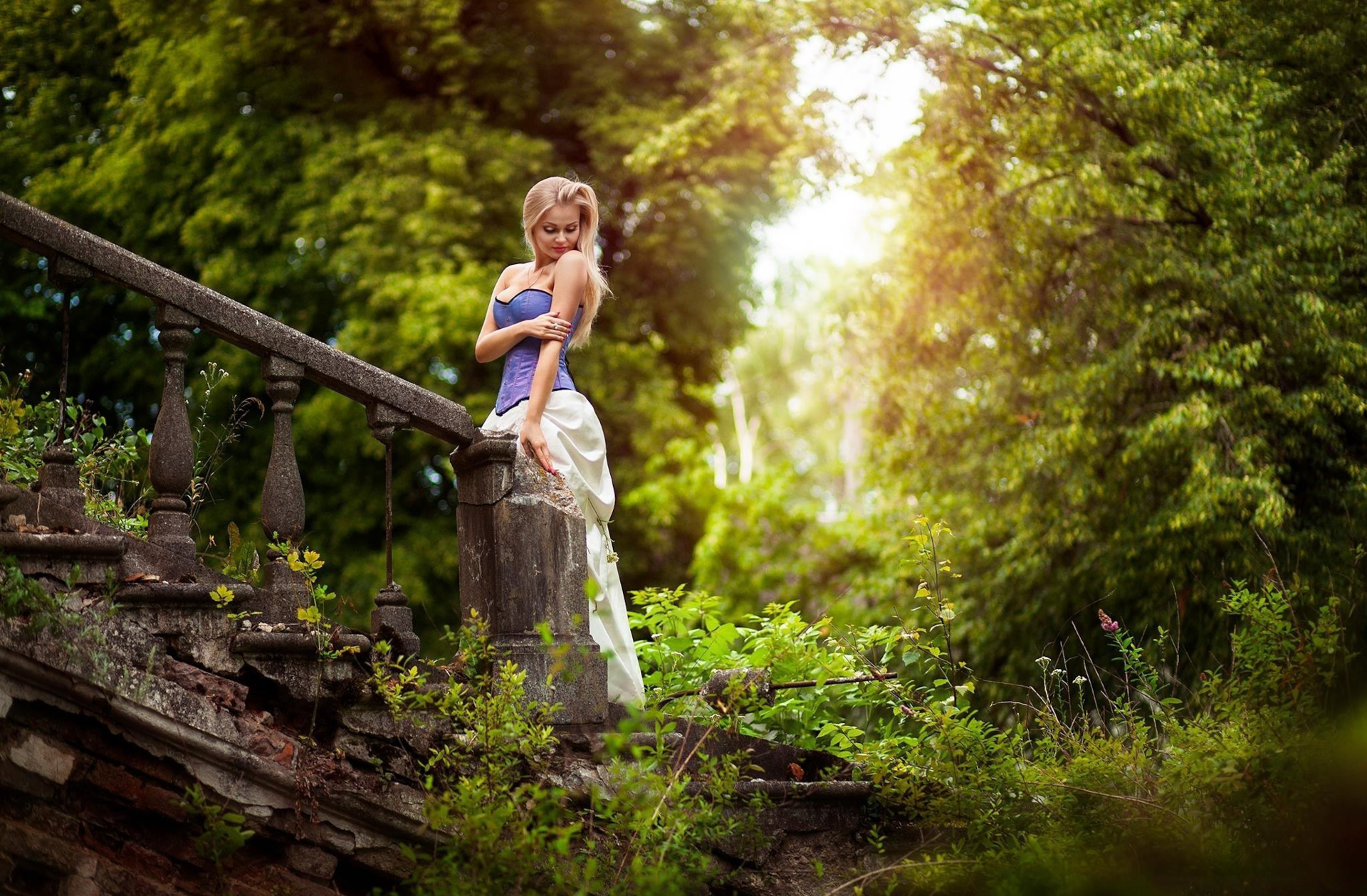 Woman in a corset and dress on a stone staircase HD Wallpaper