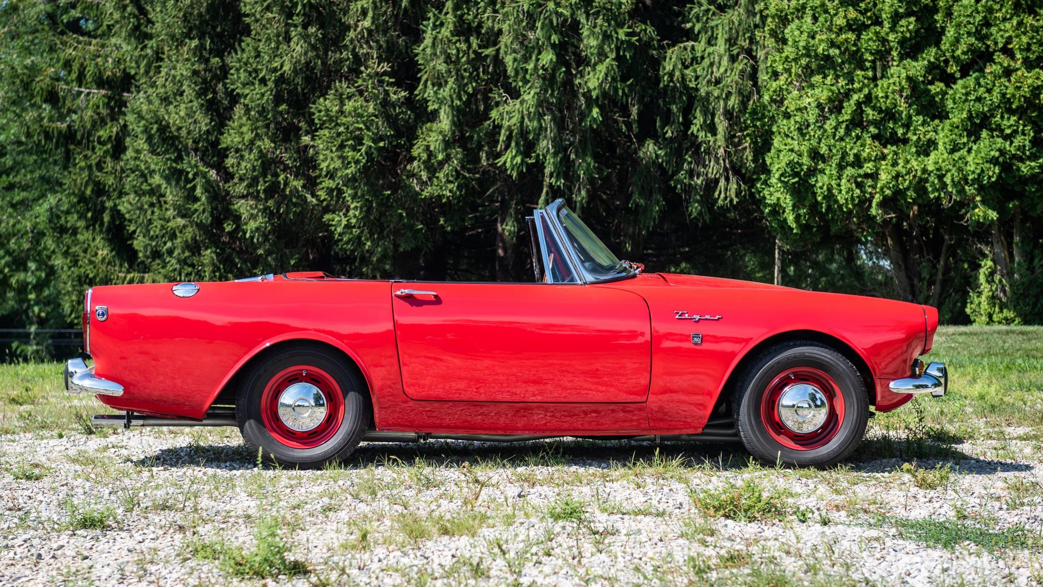 Red 1965 Sunbeam Tiger Convertible parked outdoors HD Wallpaper