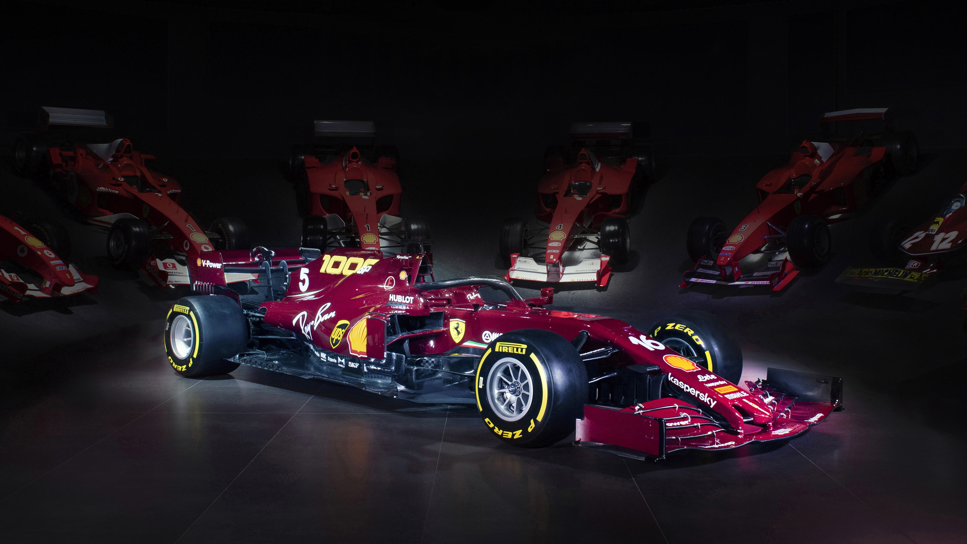 Ferrari SF1000 Formula 1 cars in a dark room HD Wallpaper