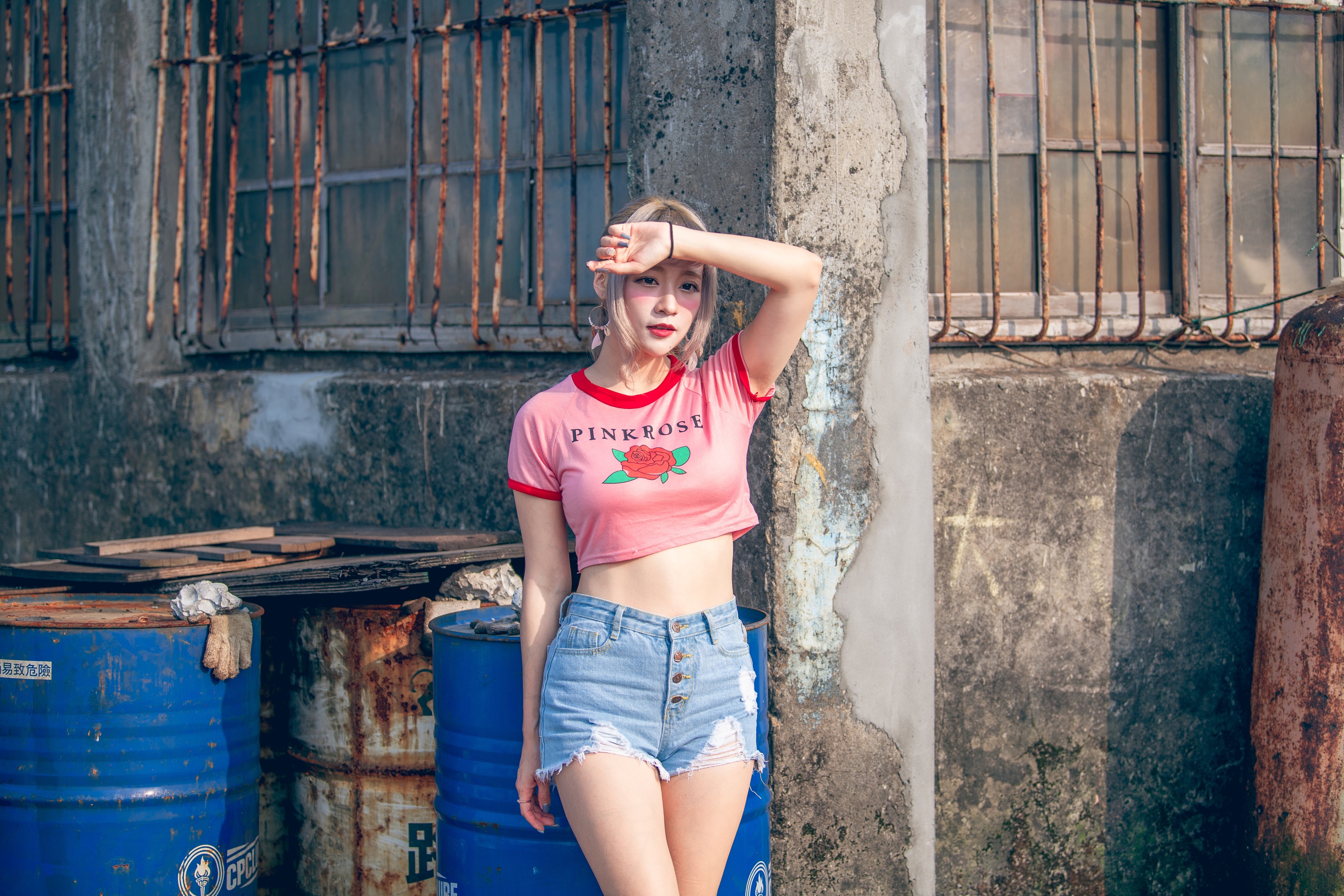 Asian woman in pink crop top and denim shorts HD Wallpaper