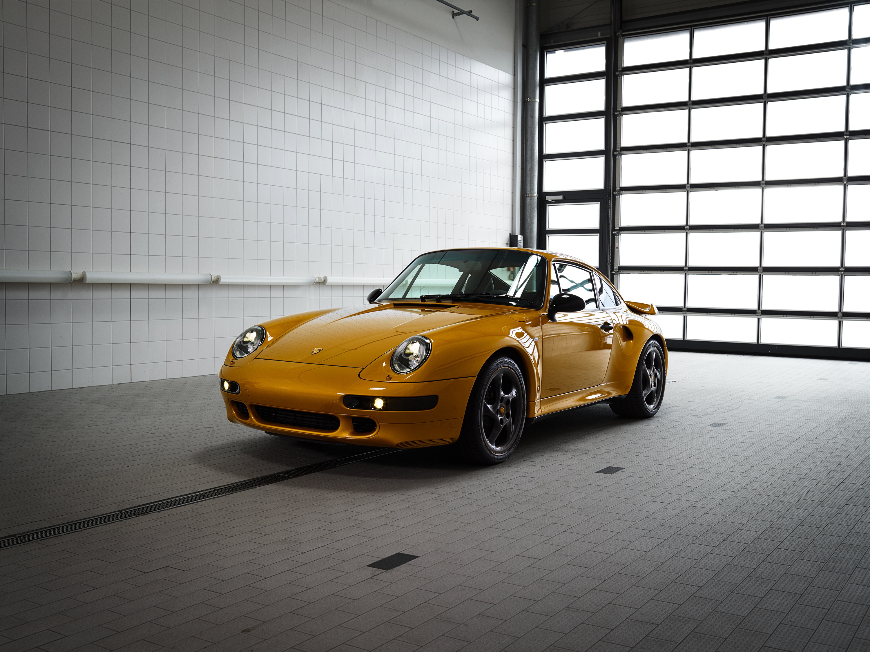 Yellow Porsche 911 Turbo in a Garage HD Wallpaper