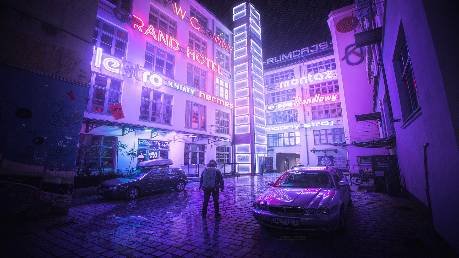 Man in Neon City at Grand Hotel HD Wallpaper