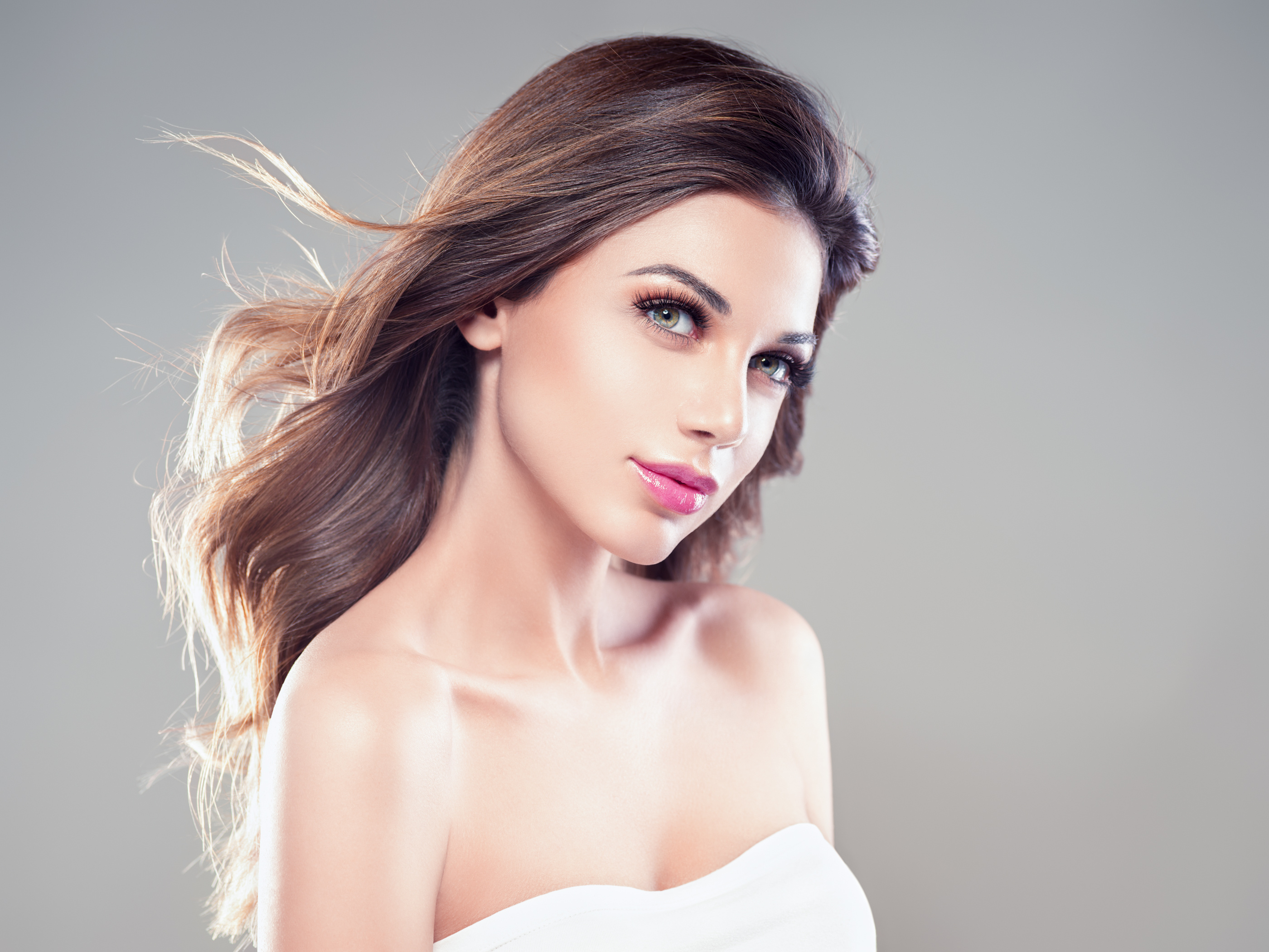 Stylish Portrait of a Woman with Flowing Hair HD Wallpaper