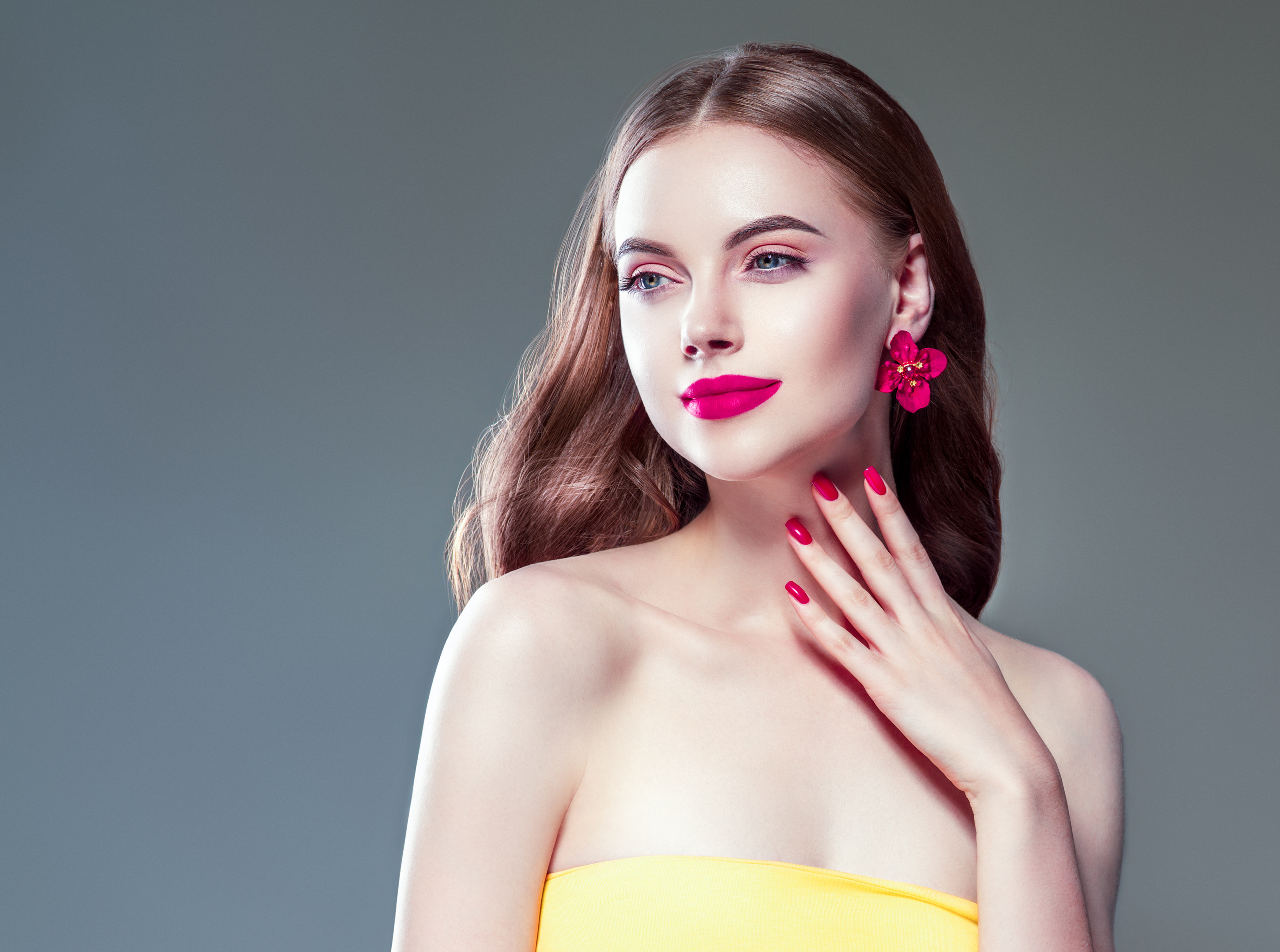 Elegant Woman with Vibrant Pink Makeup and Accessories HD Wallpaper