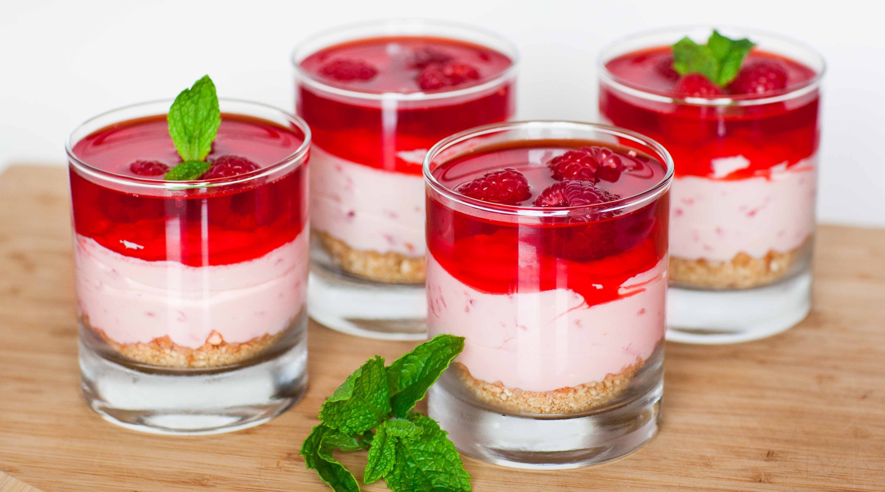Raspberry cheesecake desserts in glasses HD Wallpaper