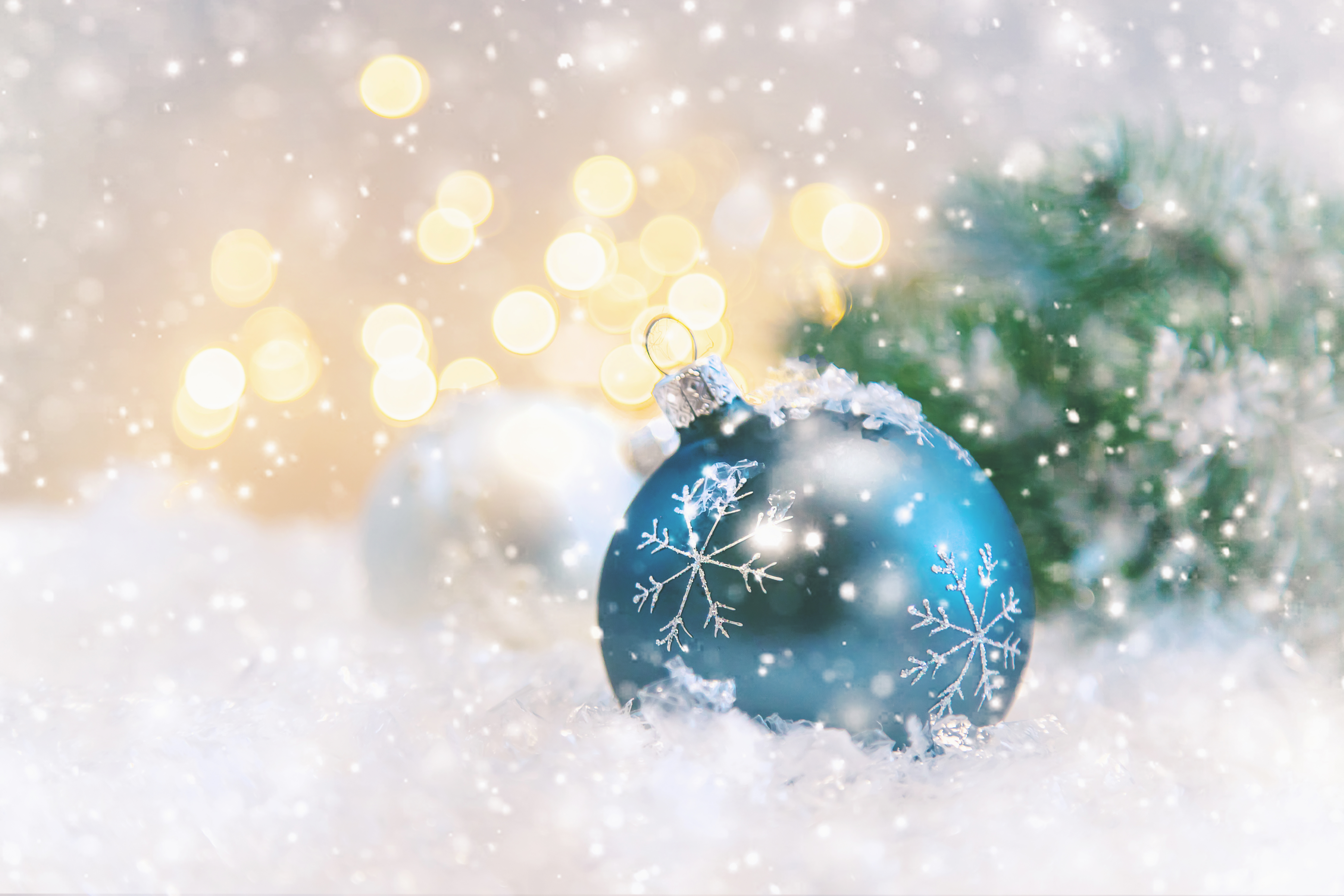 Christmas ornaments with snow and bokeh 4K HD Wallpaper