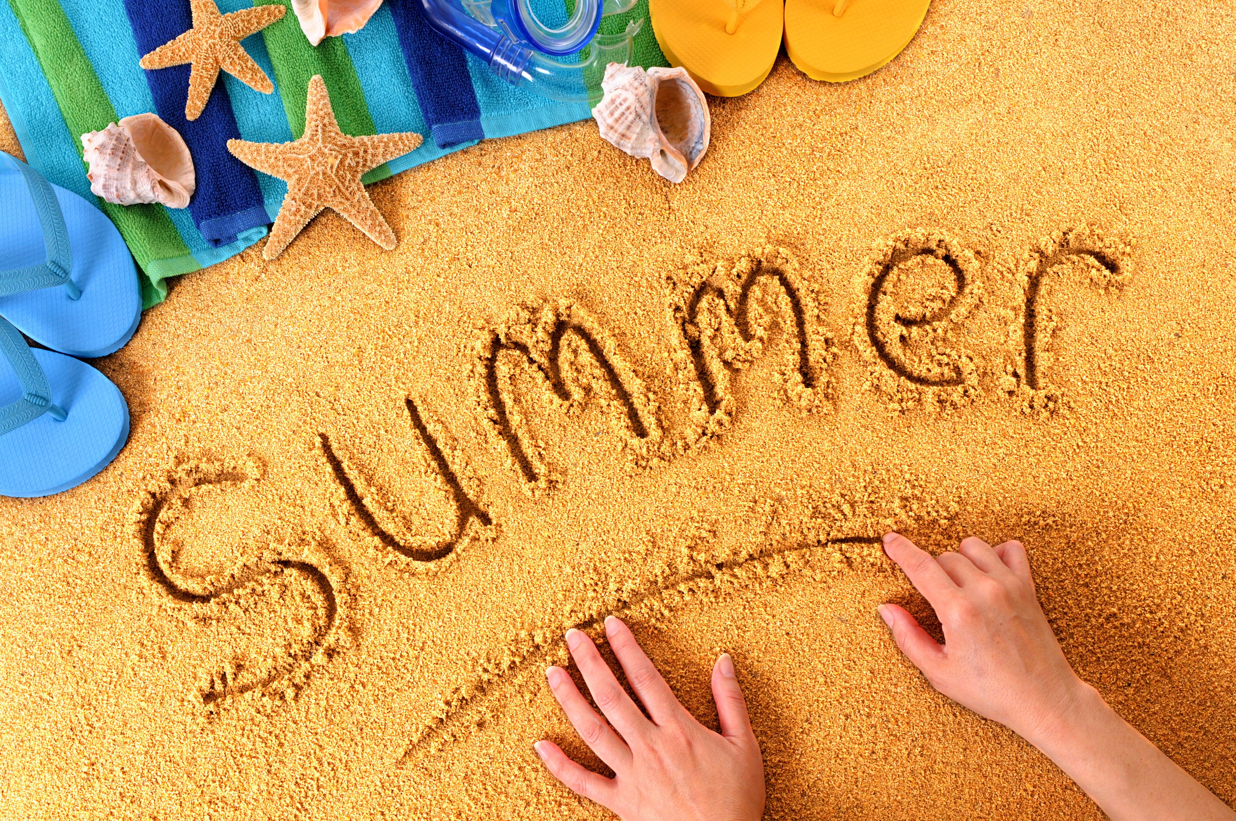 Summer written in sand with beach items HD Wallpaper