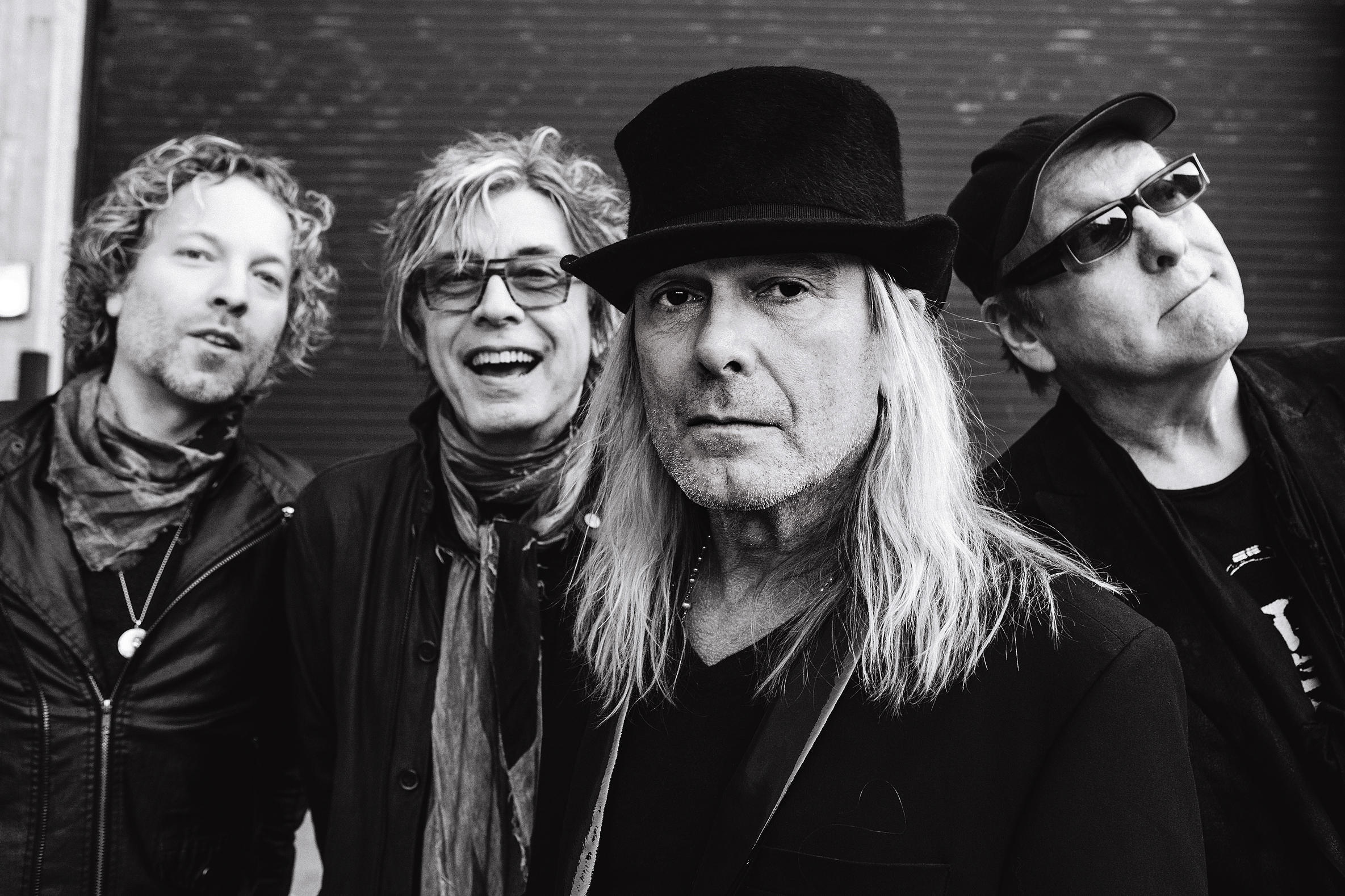 Cheap Trick band members posing for a photo HD Wallpaper