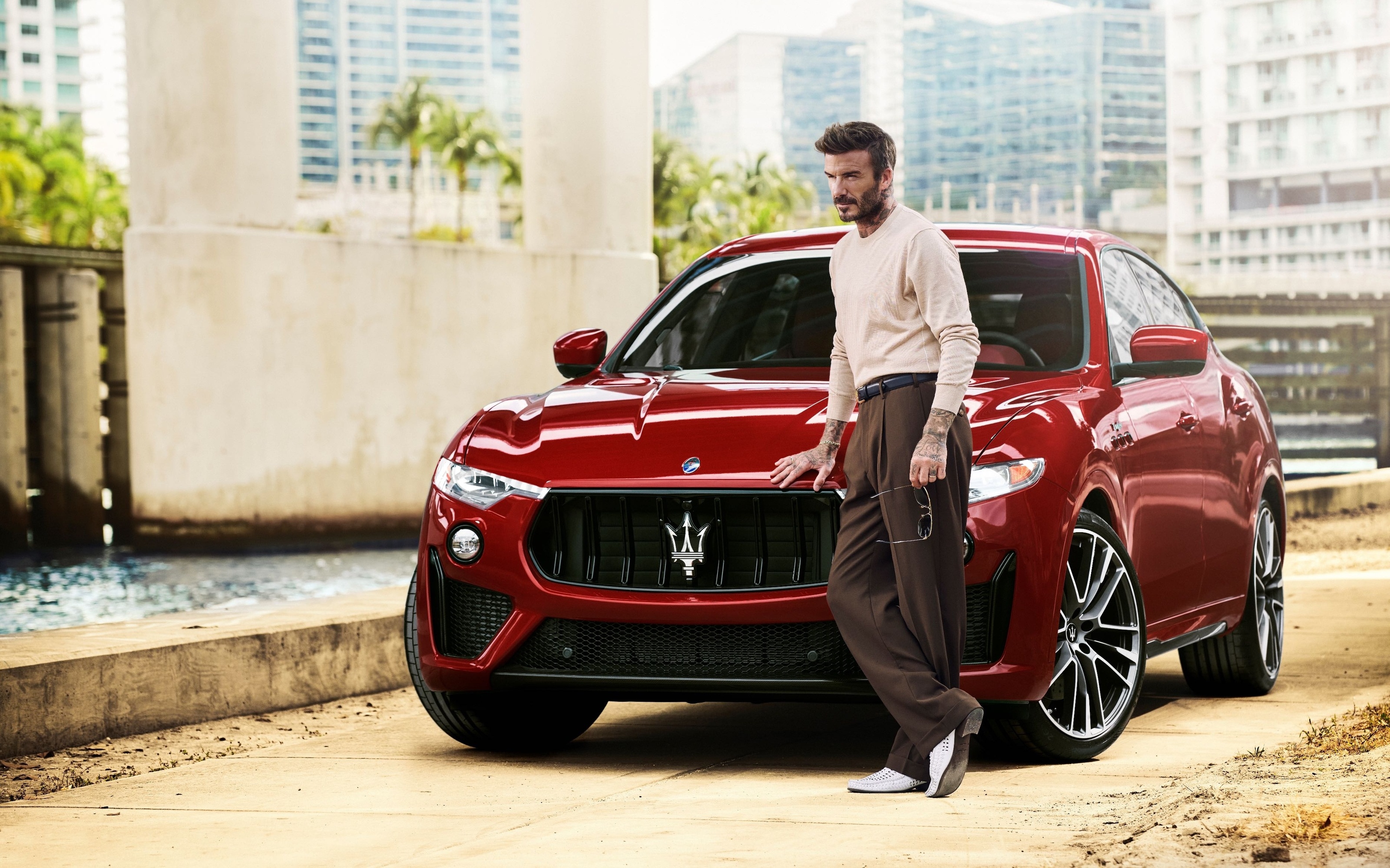 David Beckham Poses with a Red Maserati Levante Trofeo HD Wallpaper