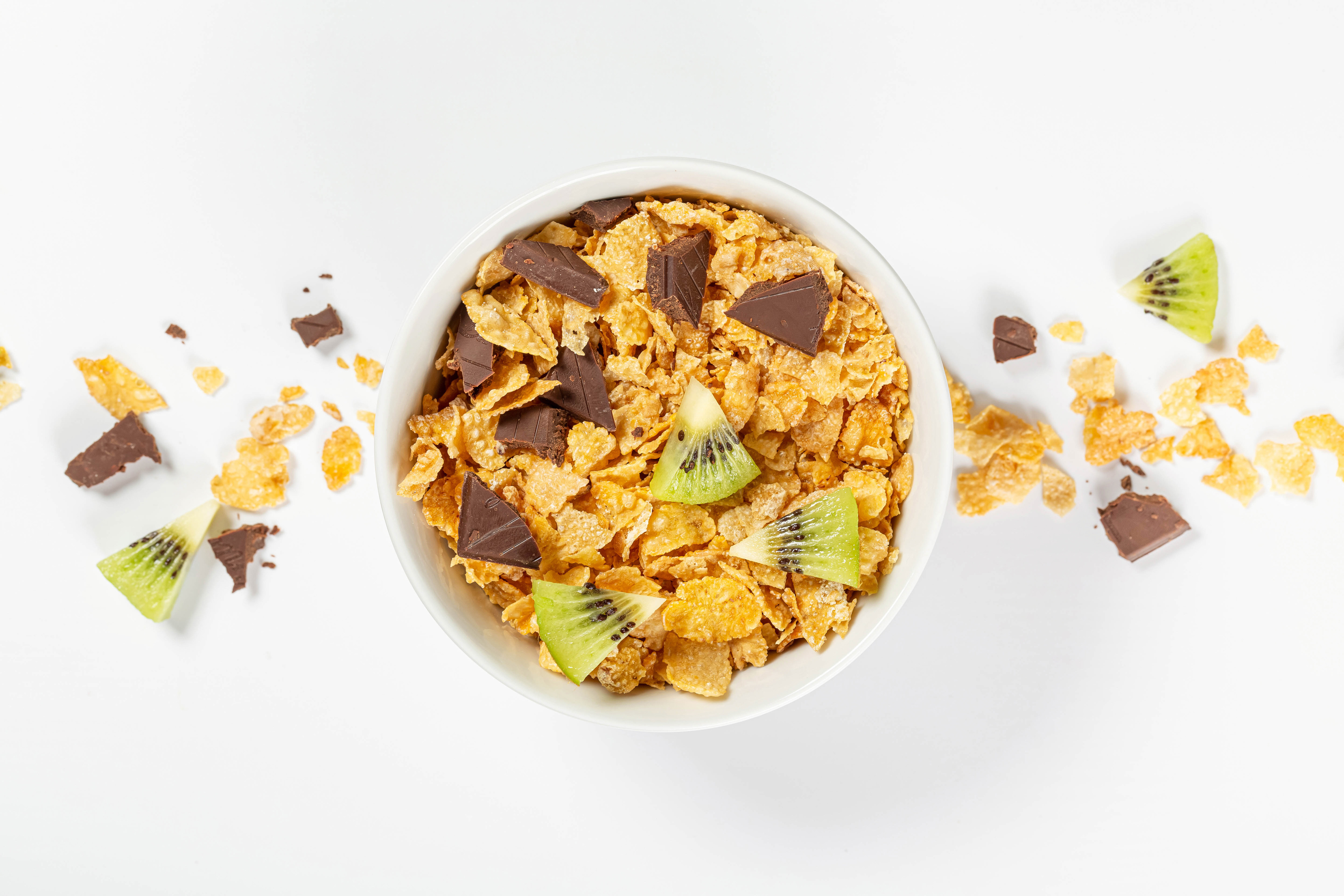 Bowl of cereal with chocolate and kiwi HD Wallpaper