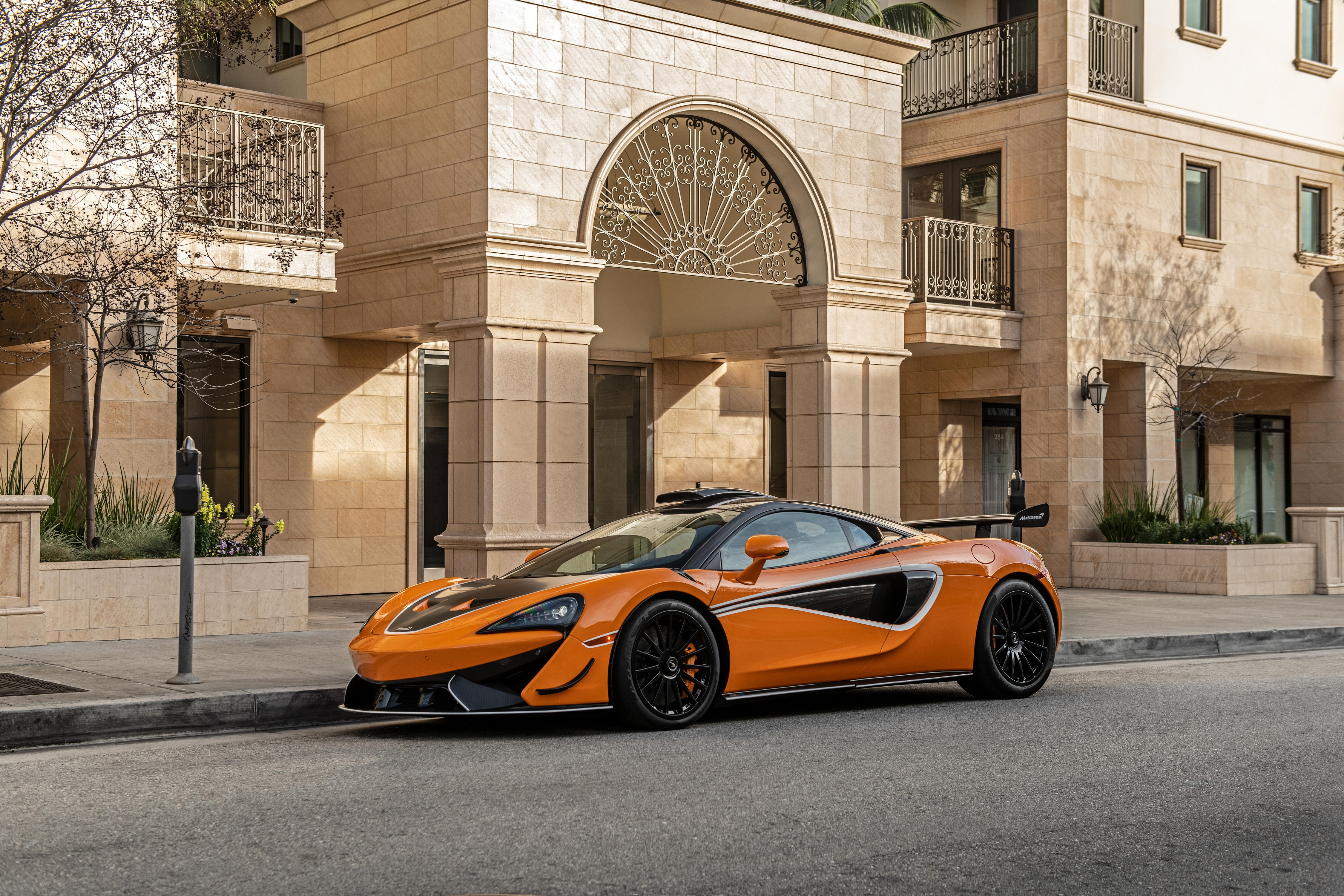 Orange McLaren 620R 4K parked on street HD Wallpaper