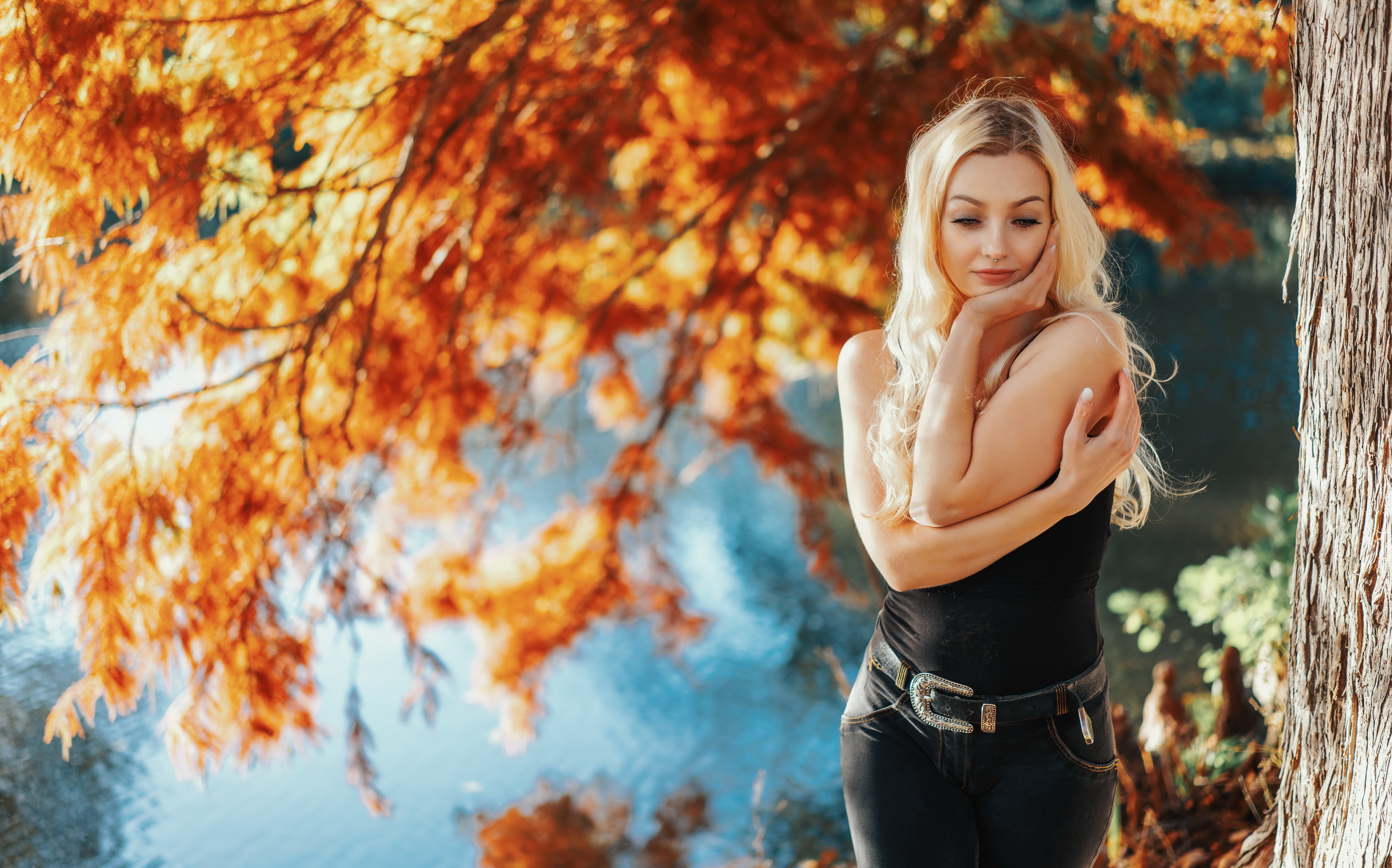Blonde Woman Posing by a Lake in Autumn HD Wallpaper