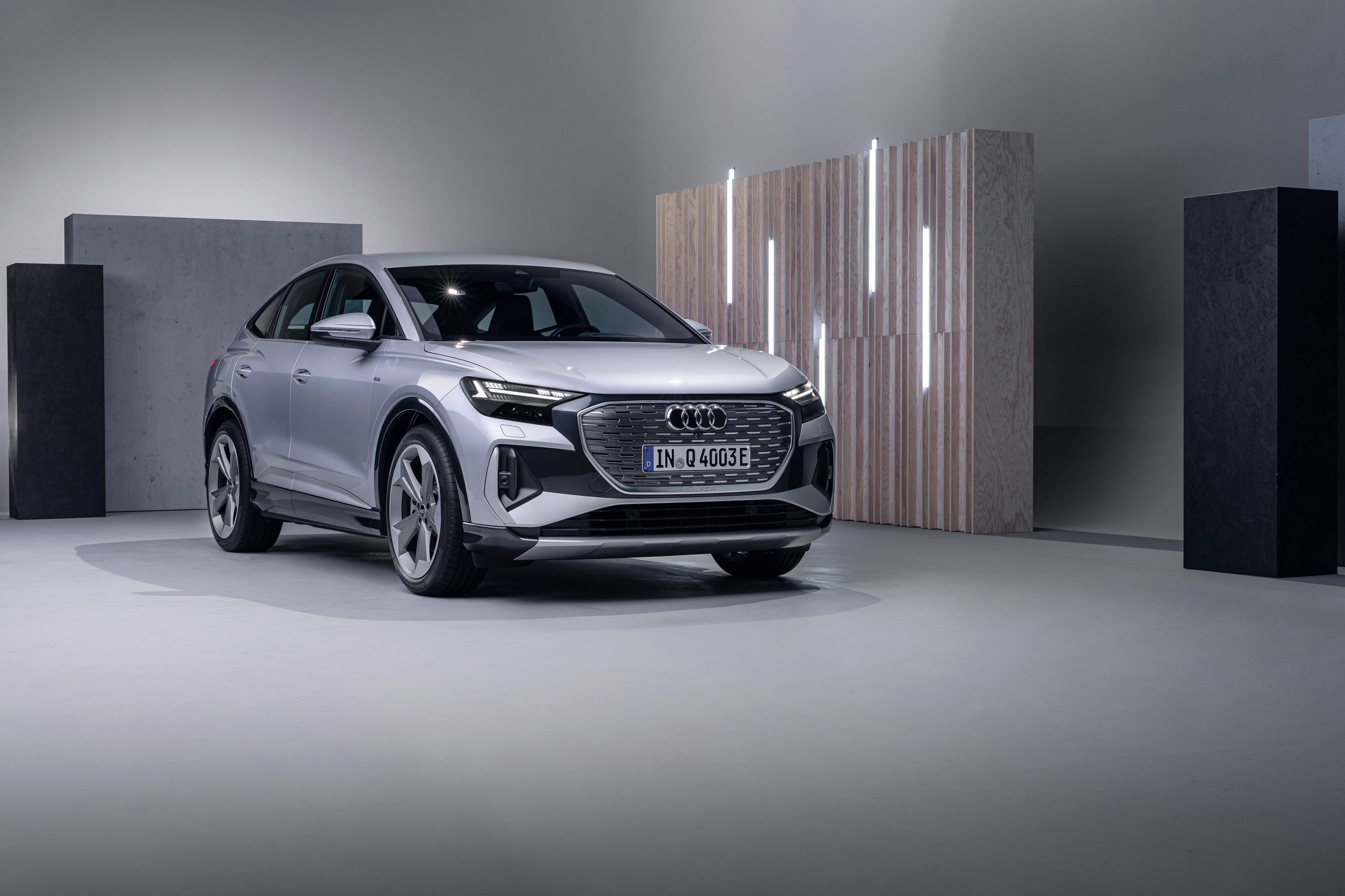 Silver Audi Q4 E-tron 4K electric SUV HD Wallpaper