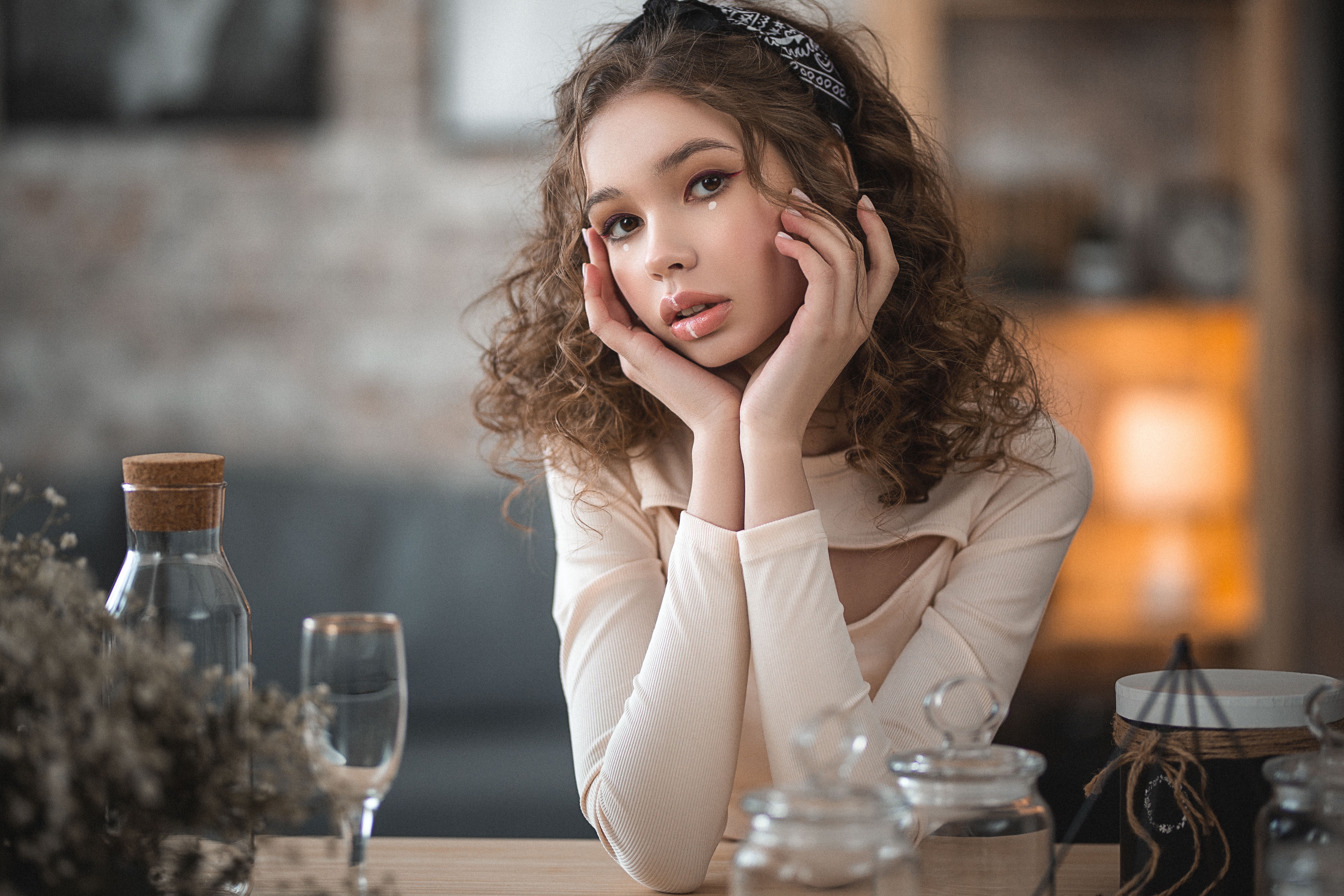 Brunette woman with curly hair and bandana HD Wallpaper