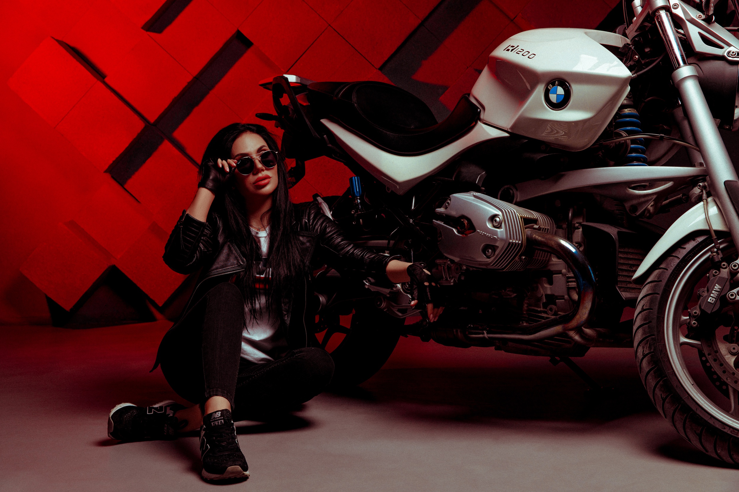 Woman in leather jacket with BMW motorcycle HD Wallpaper